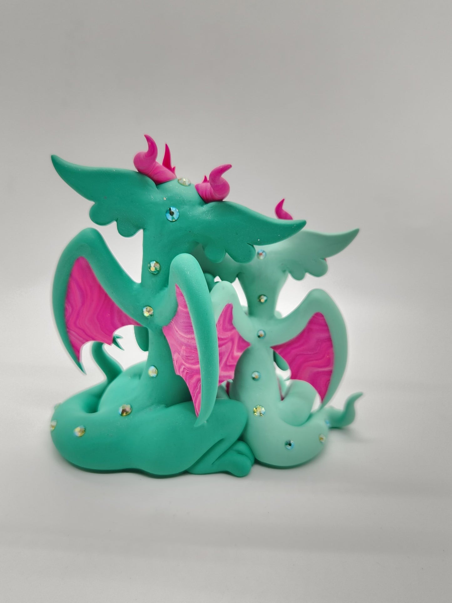 "Maji & Umea" green and pink dragon mother and child sculpture