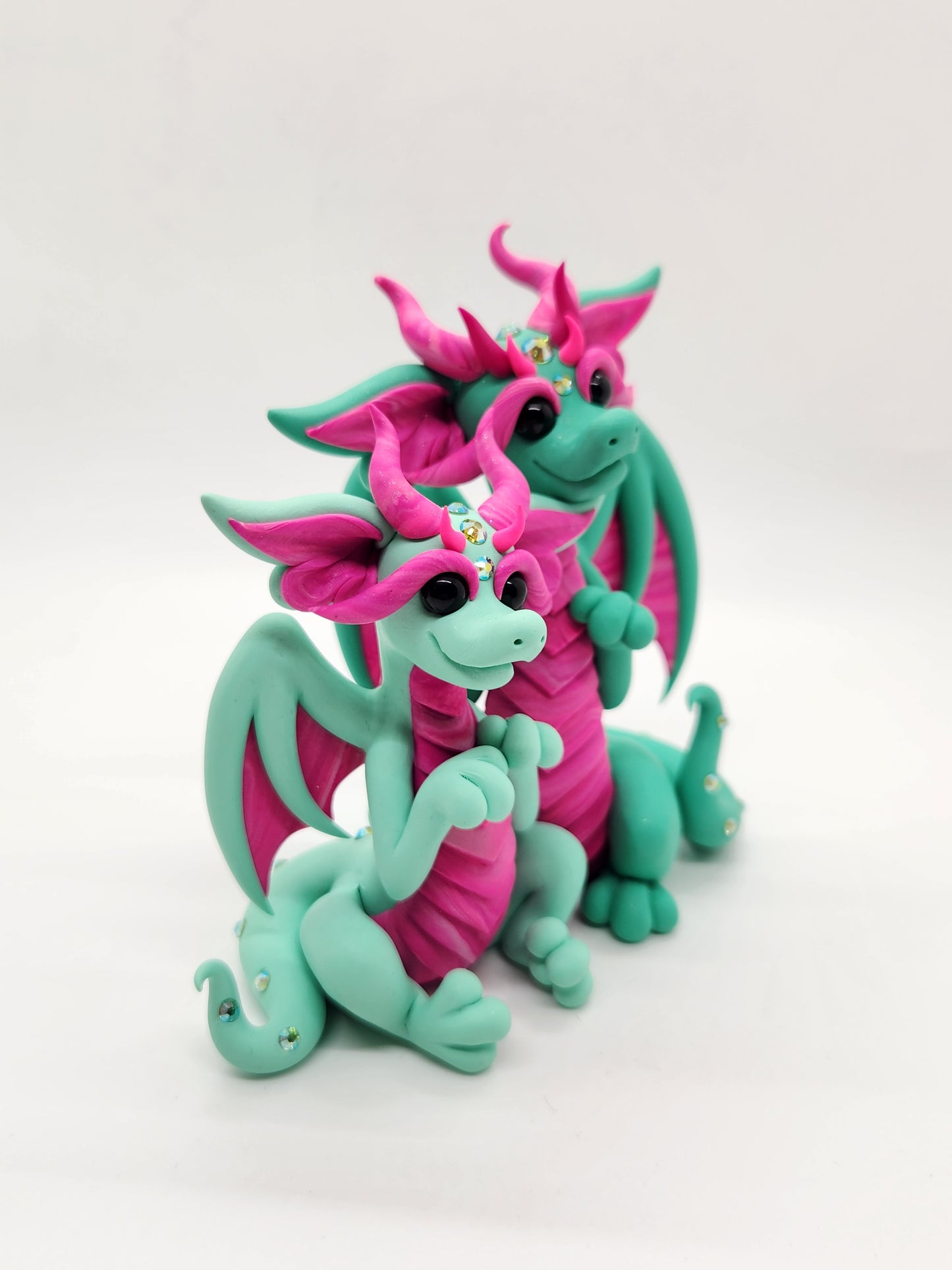 "Maji & Umea" green and pink dragon mother and child sculpture