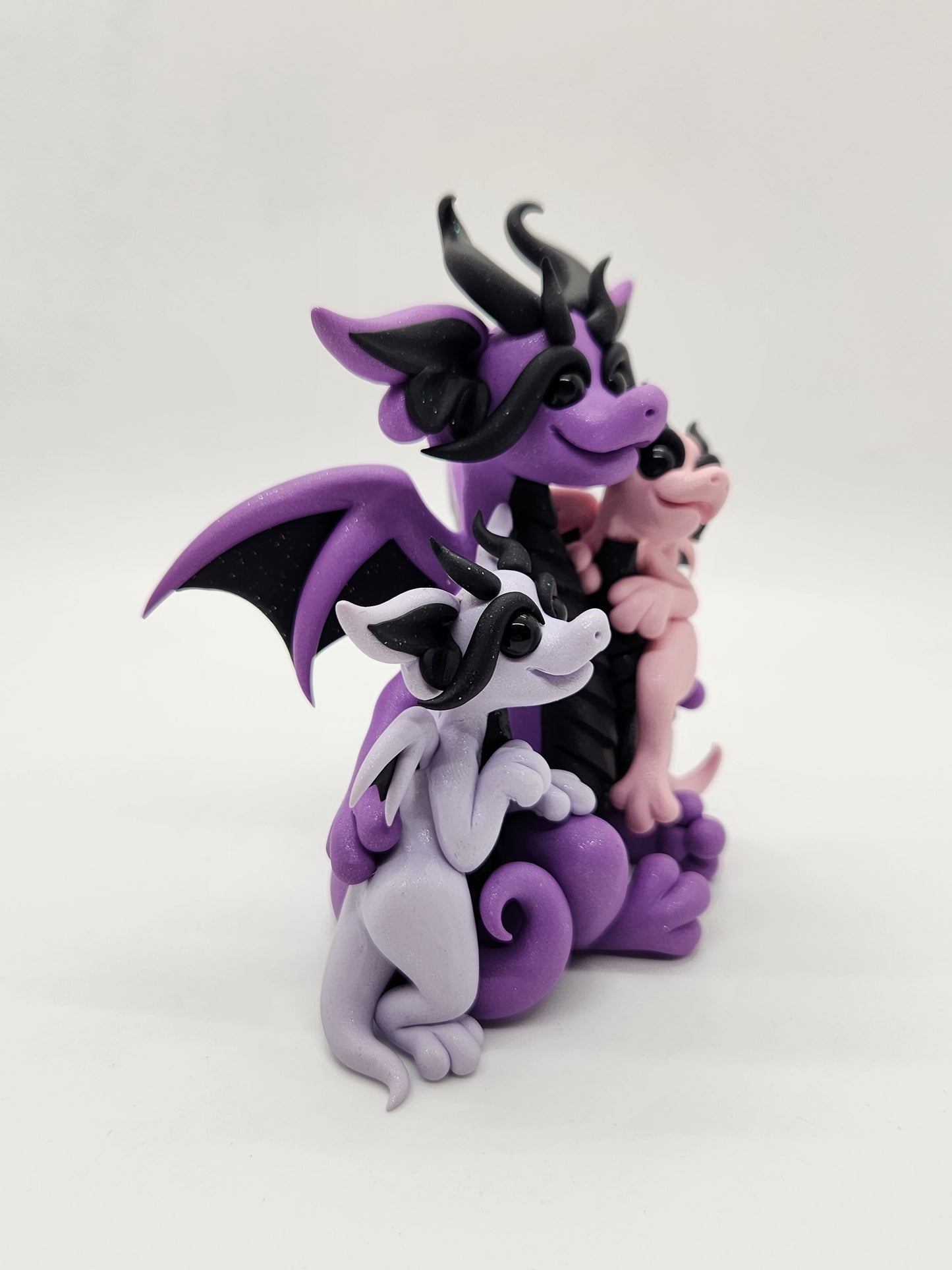 "Eomma, Nadó & Babi" purple and black dragon mother and babies sculpture