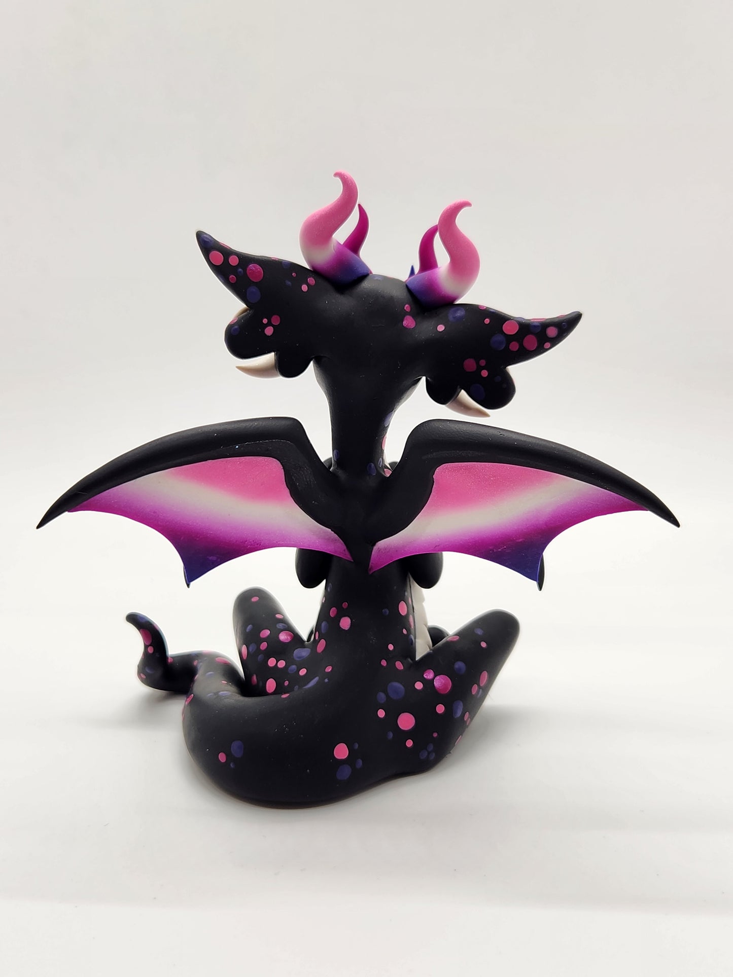 "Rory" black and white genderfluid pride dragon sculpture