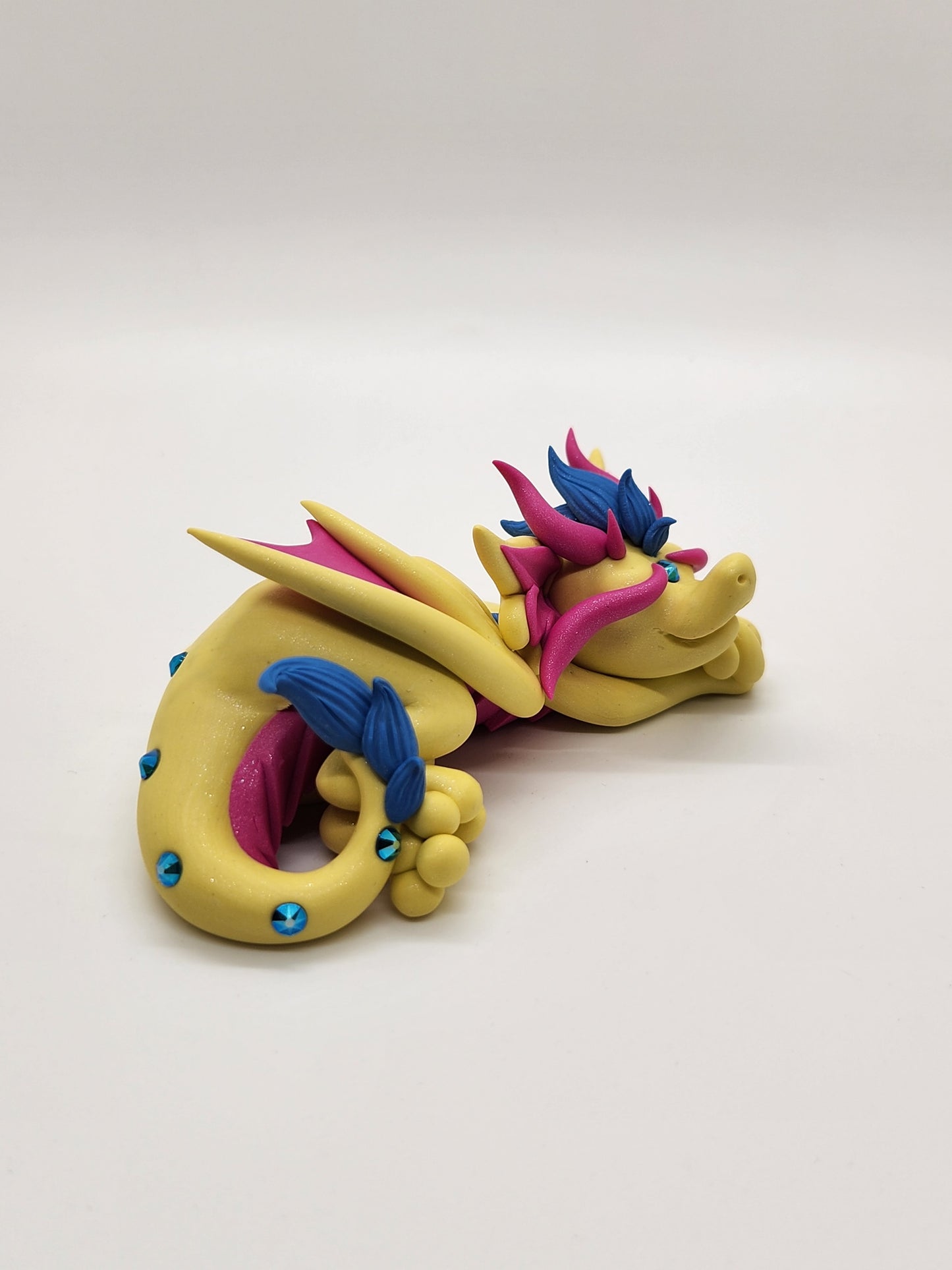 "Devin" yellow and pink pan pride dragon sculpture