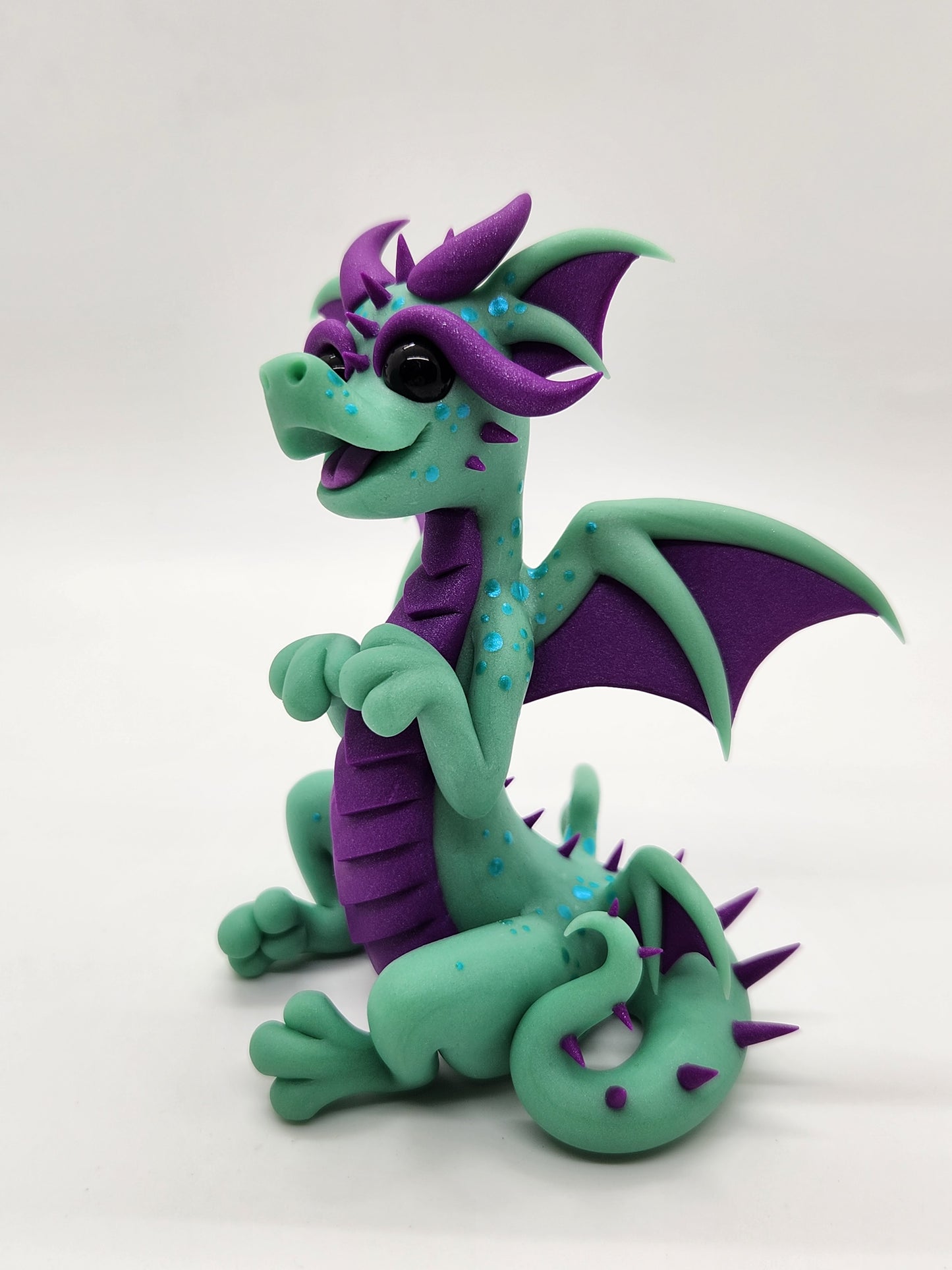 "Globoi" green and purple glow in the dark alien dragon sculpture