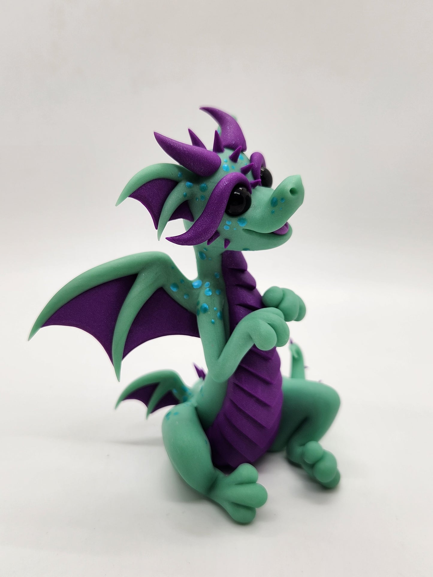 "Globoi" green and purple glow in the dark alien dragon sculpture