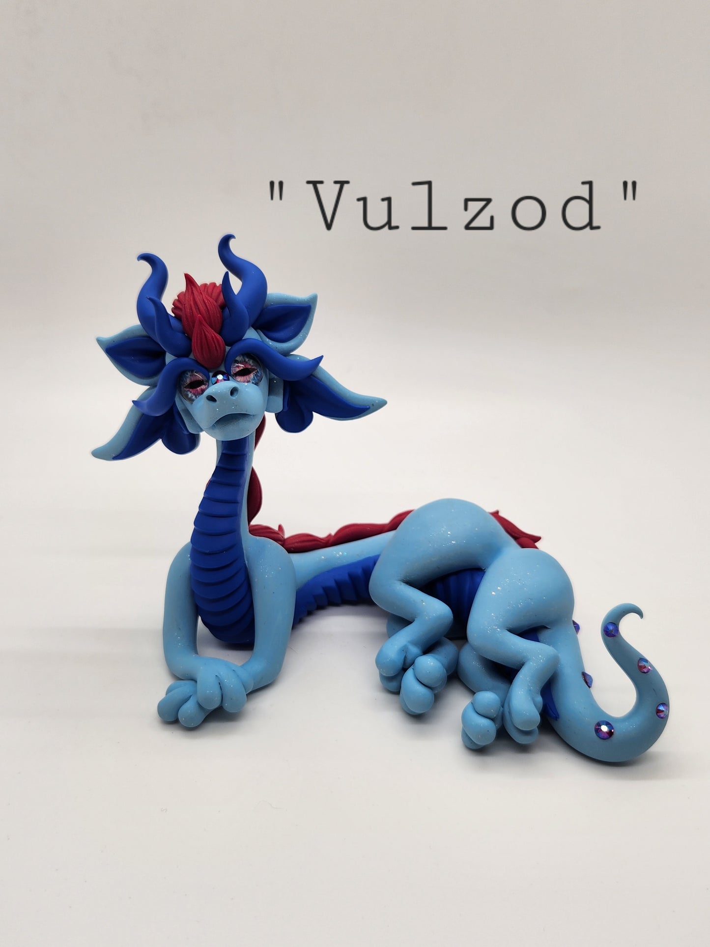 "Vulzod" blue and red alien dragon sculpture