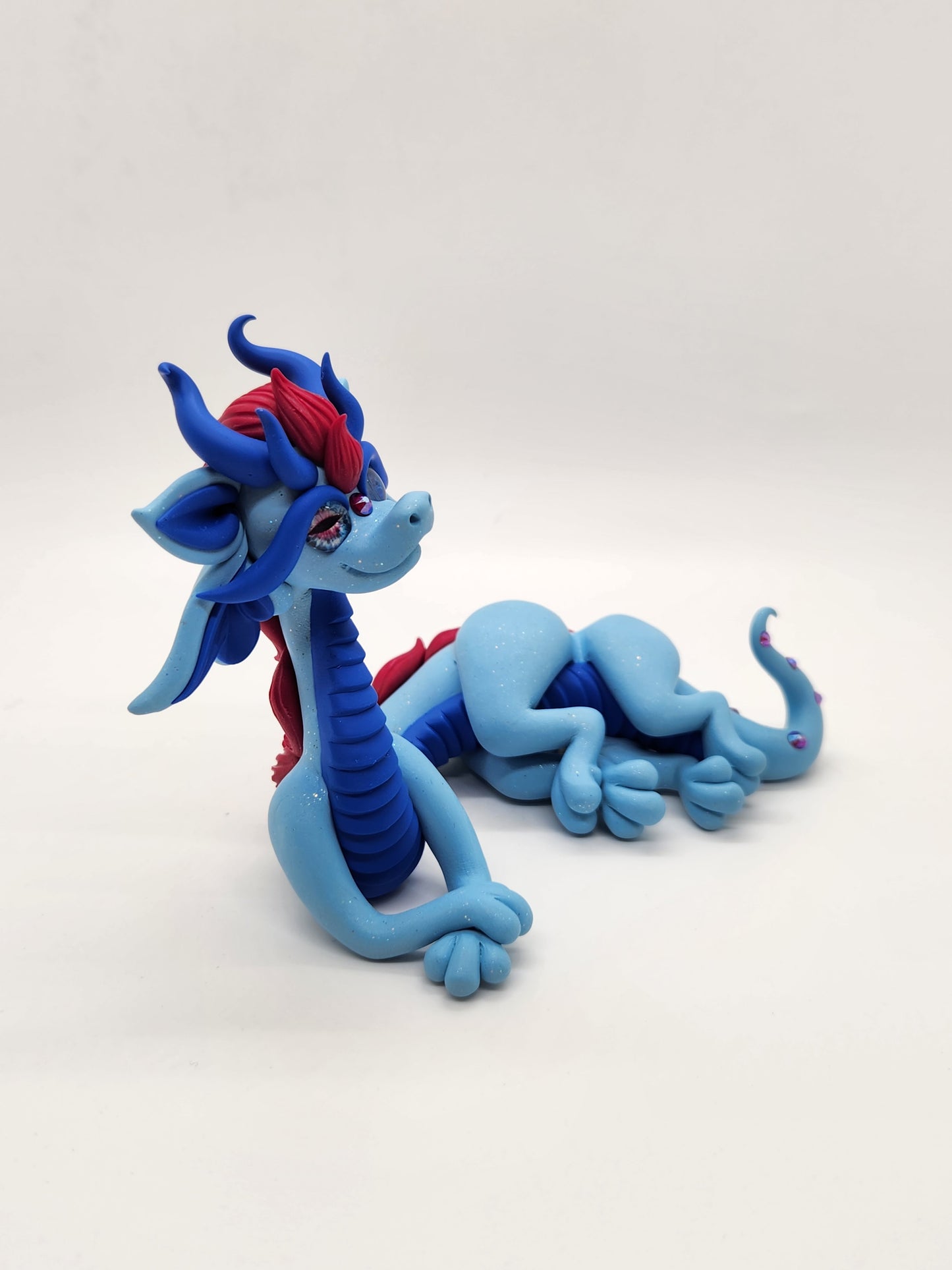 "Vulzod" blue and red alien dragon sculpture