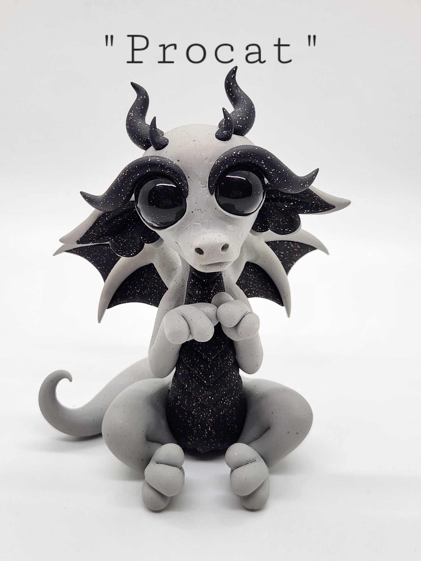 "Procat" classic gray alien dragon sculpture