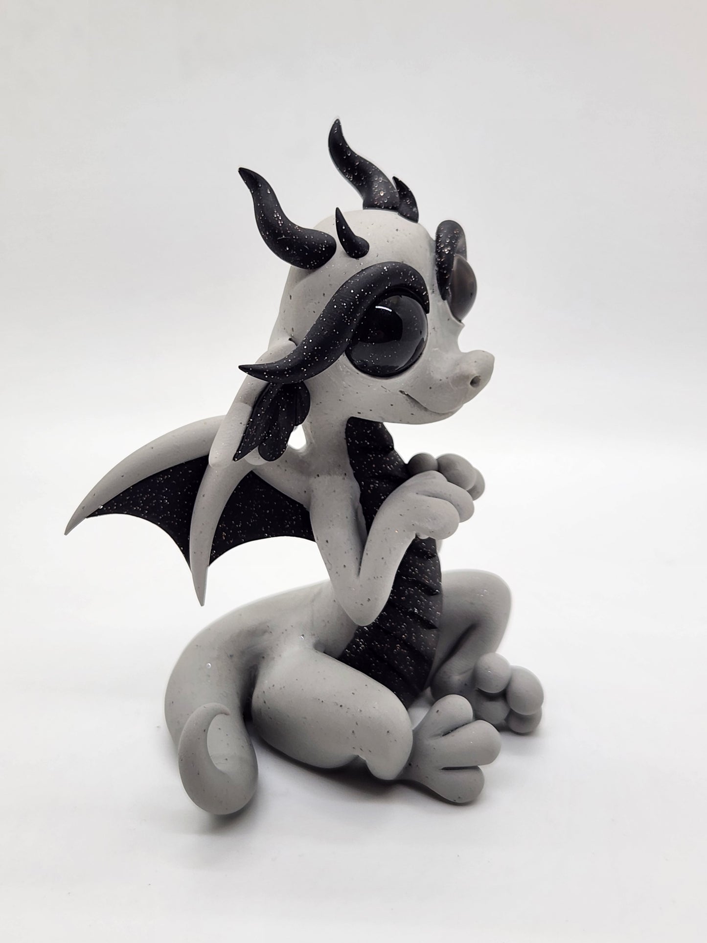 "Procat" classic gray alien dragon sculpture