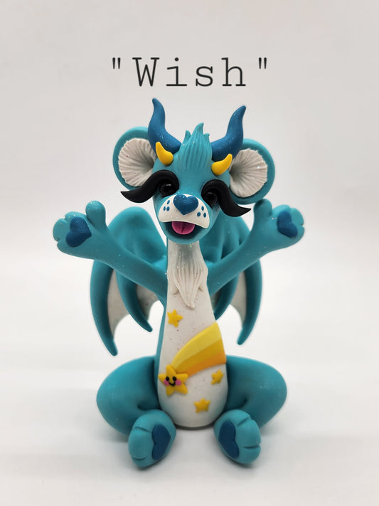 "Wish" blue and yellow care bear dragon sculpture