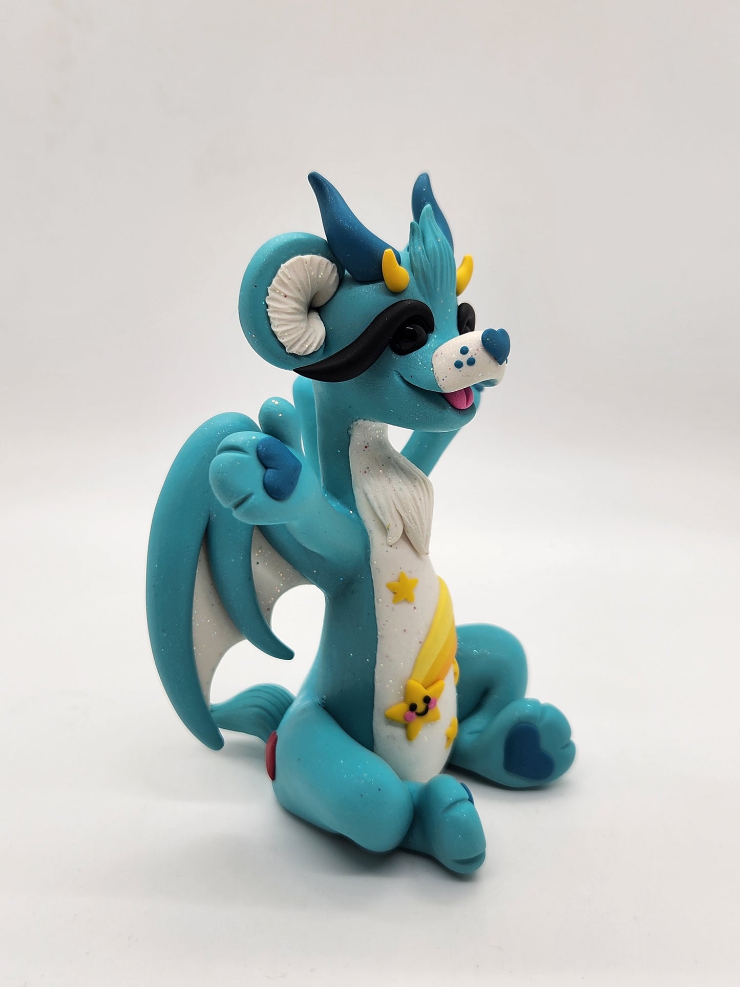 "Wish" blue and yellow care bear dragon sculpture