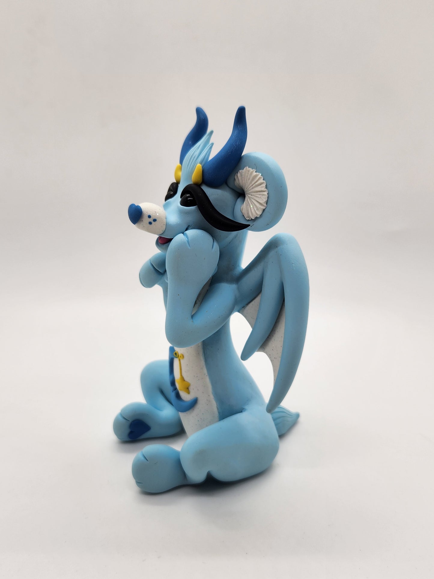 "Bedtime" blue care bear dragon sculpture