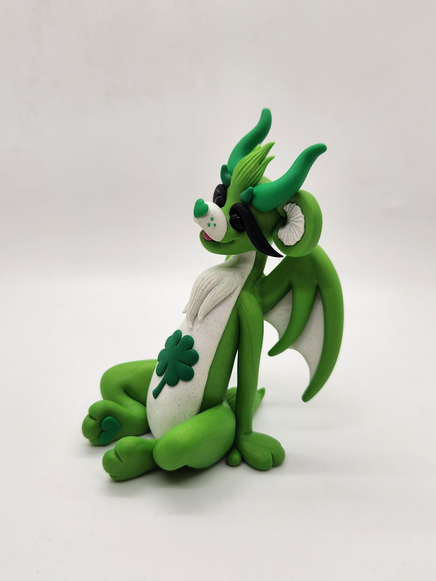 "Good Luck" green care bear dragon sculpture