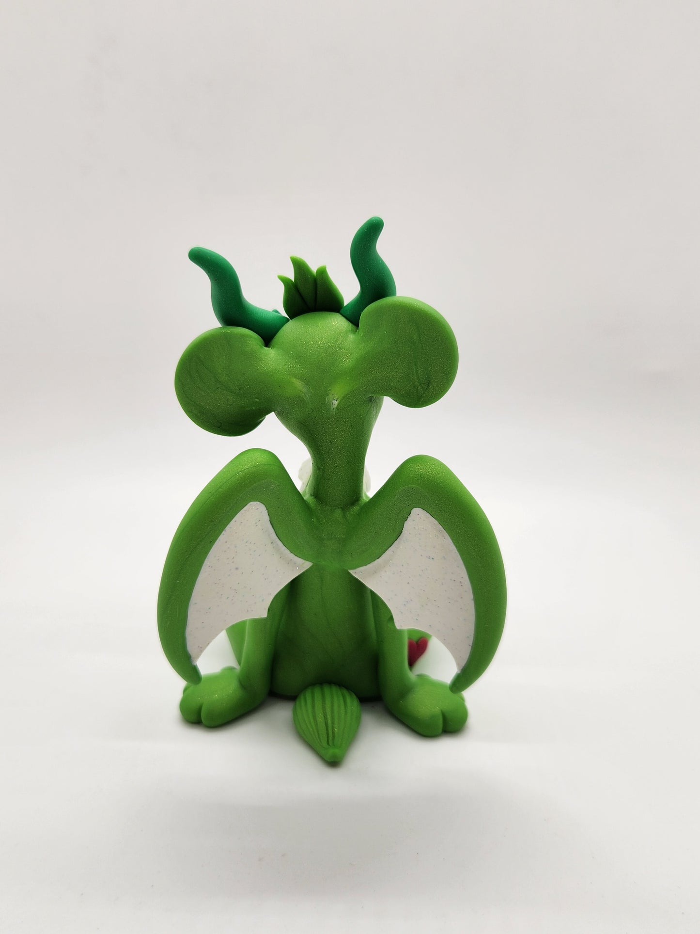 "Good Luck" green care bear dragon sculpture