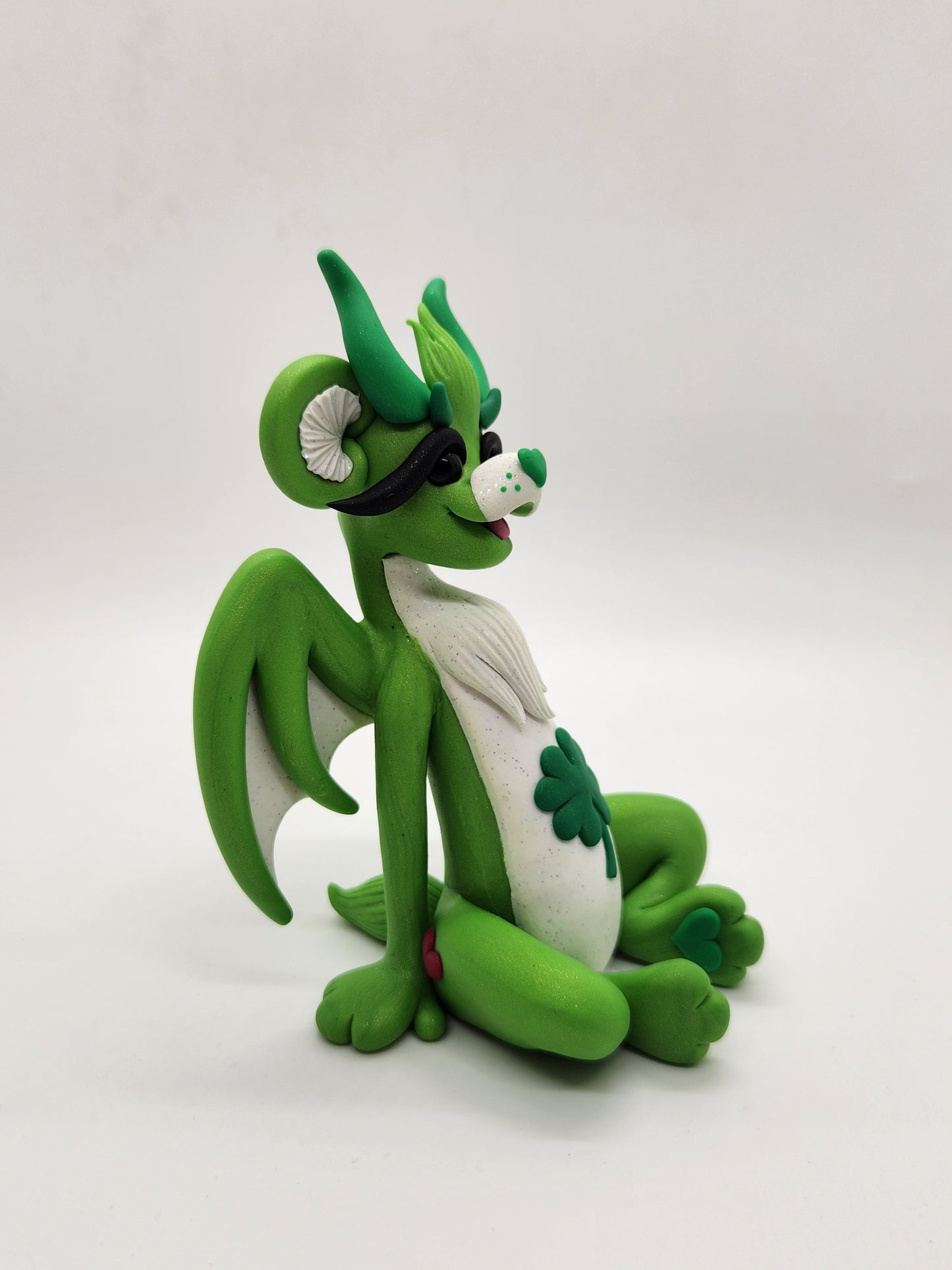 "Good Luck" green care bear dragon sculpture