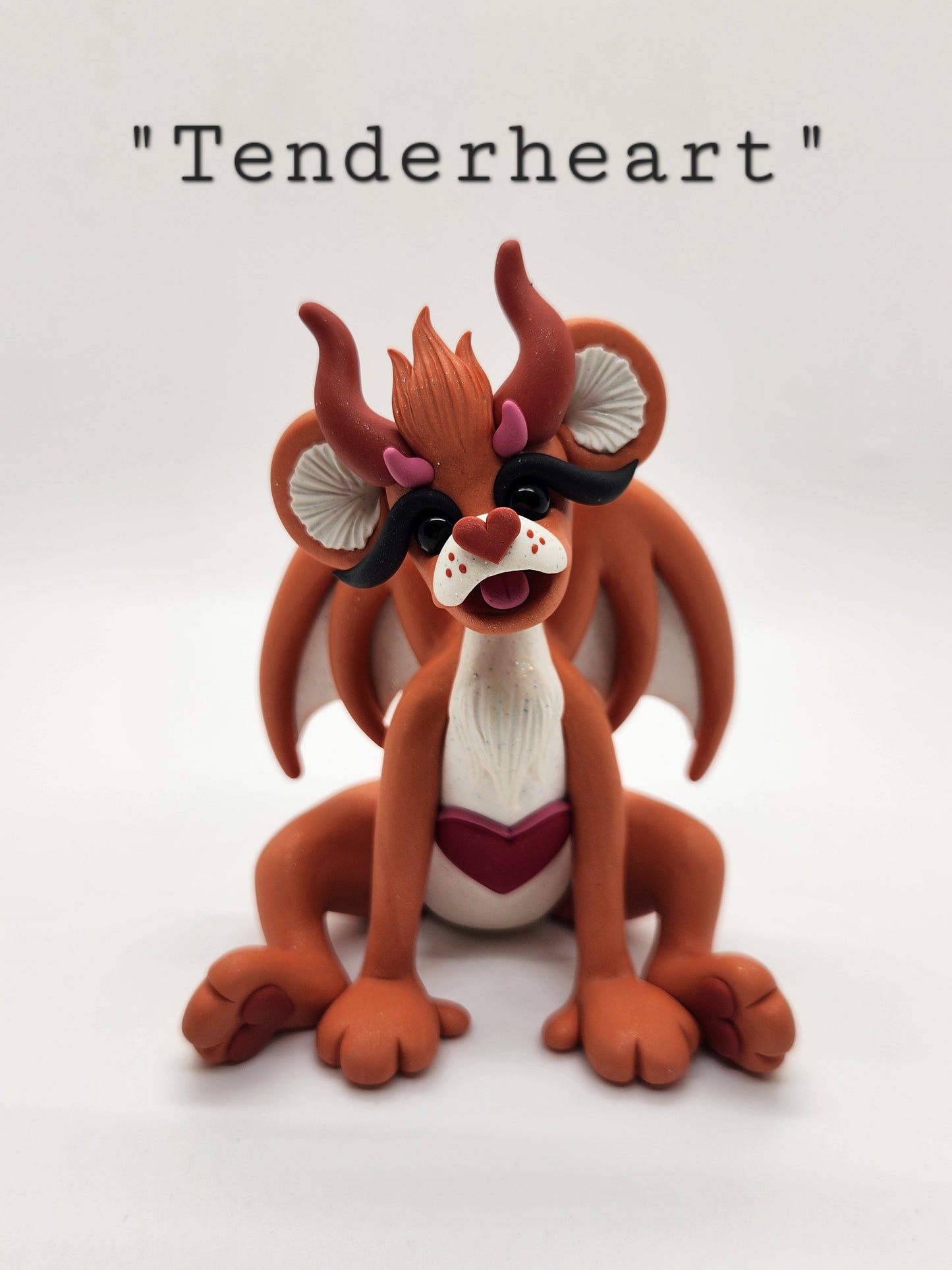 "Tenderheart" orange care bear dragon sculpture