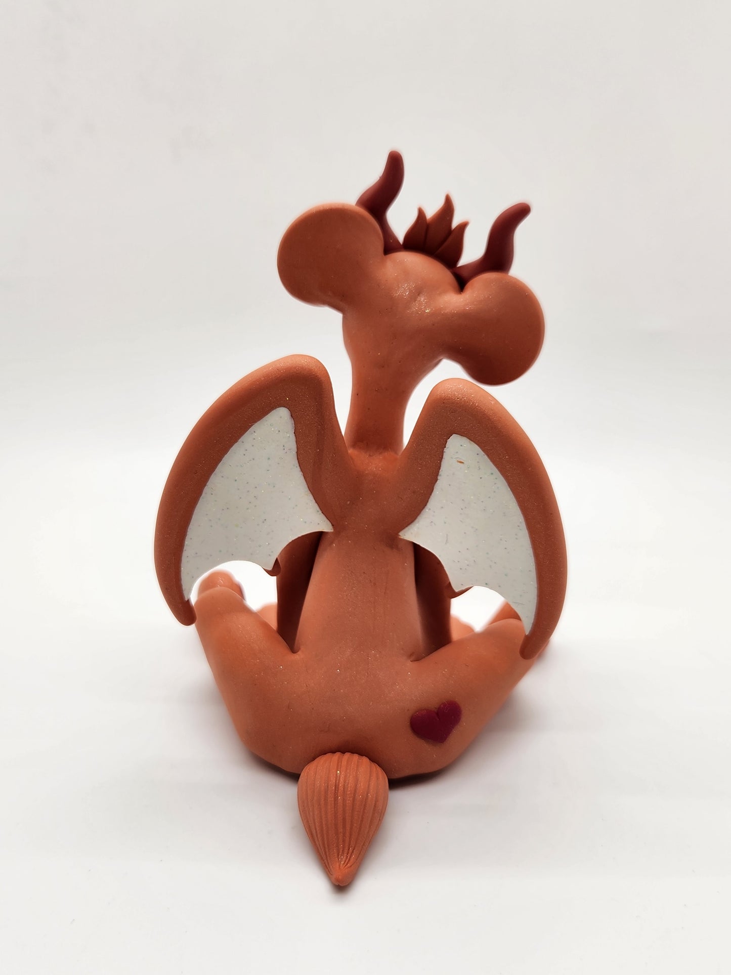 "Tenderheart" orange care bear dragon sculpture