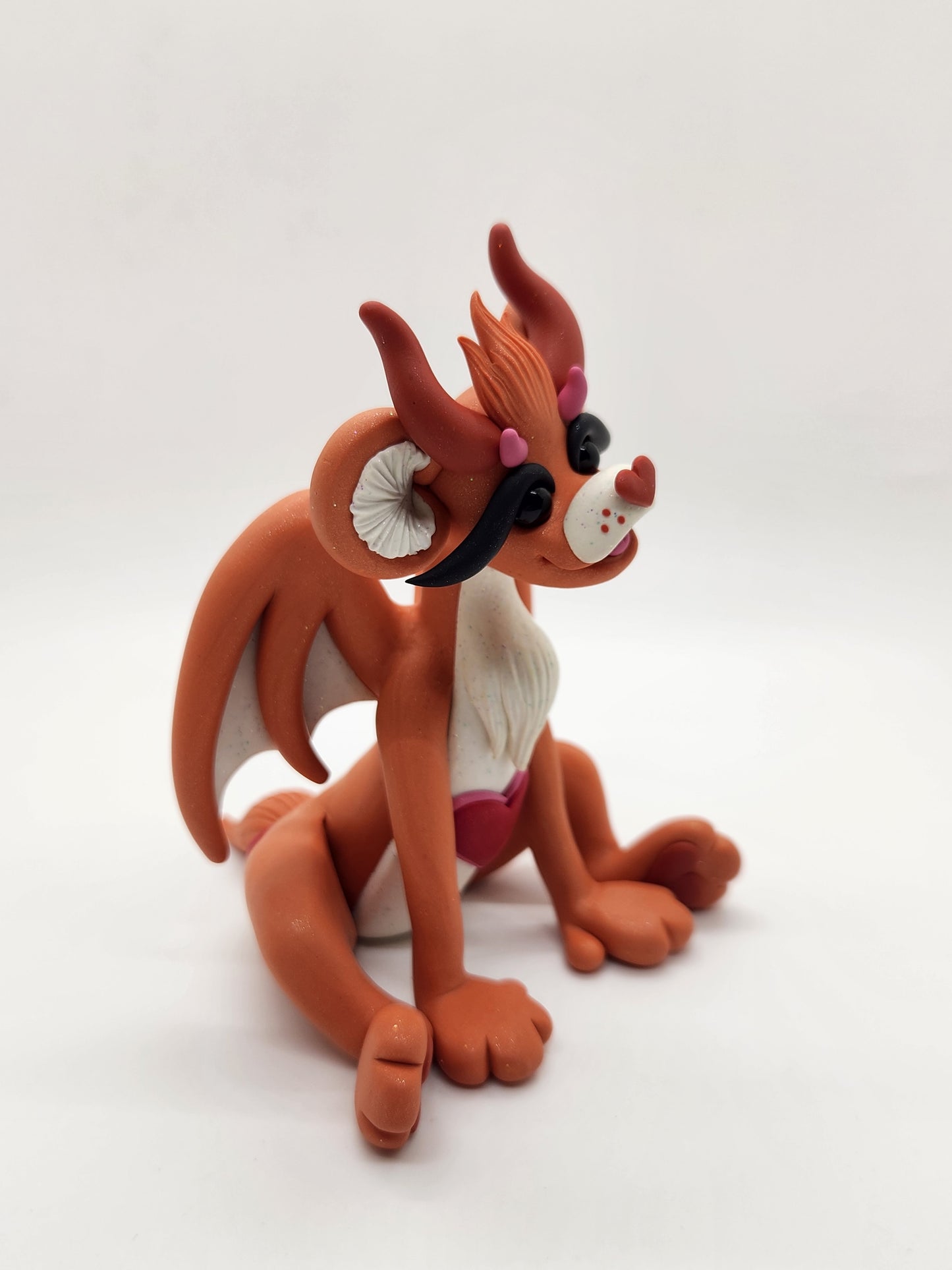 "Tenderheart" orange care bear dragon sculpture