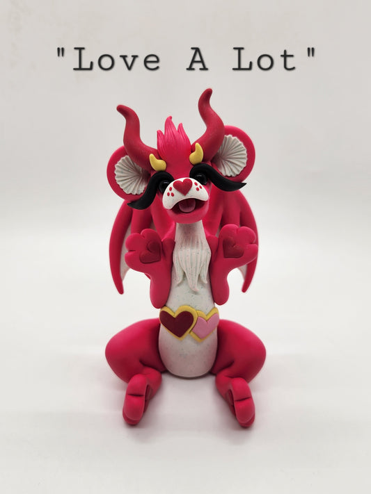 "Love A Lot" pink care bear dragon sculpture