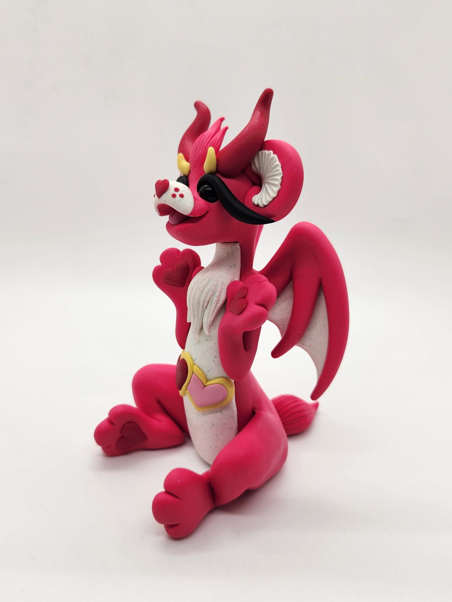 "Love A Lot" pink care bear dragon sculpture