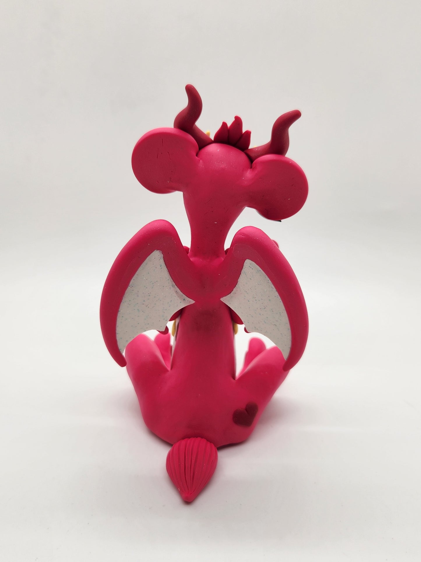 "Love A Lot" pink care bear dragon sculpture