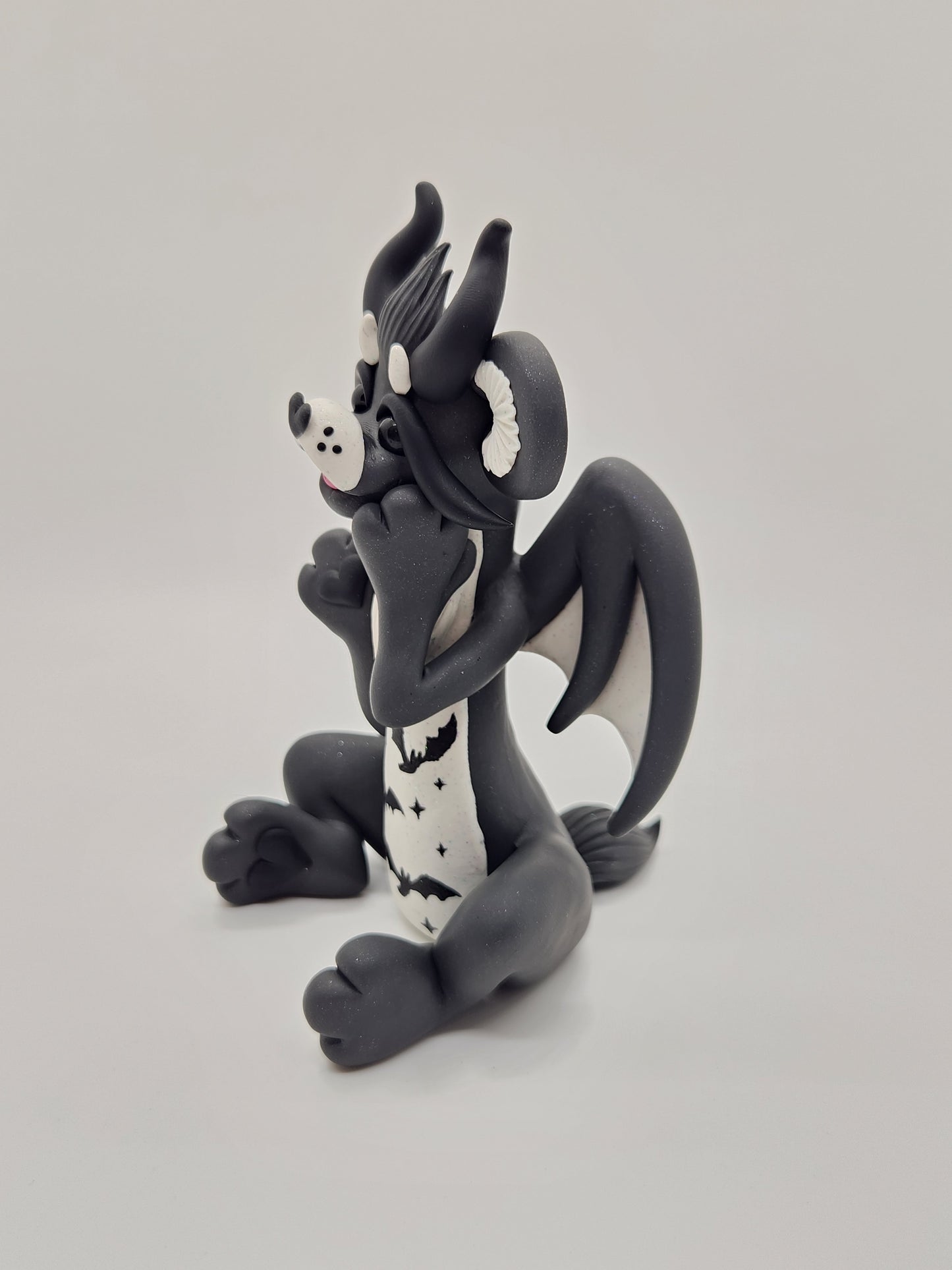 "Batty" black care bear dragon sculpture