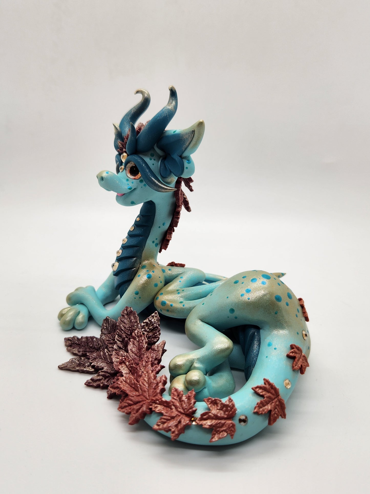 "Maple" blue and orange fall leaves dragon sculpture