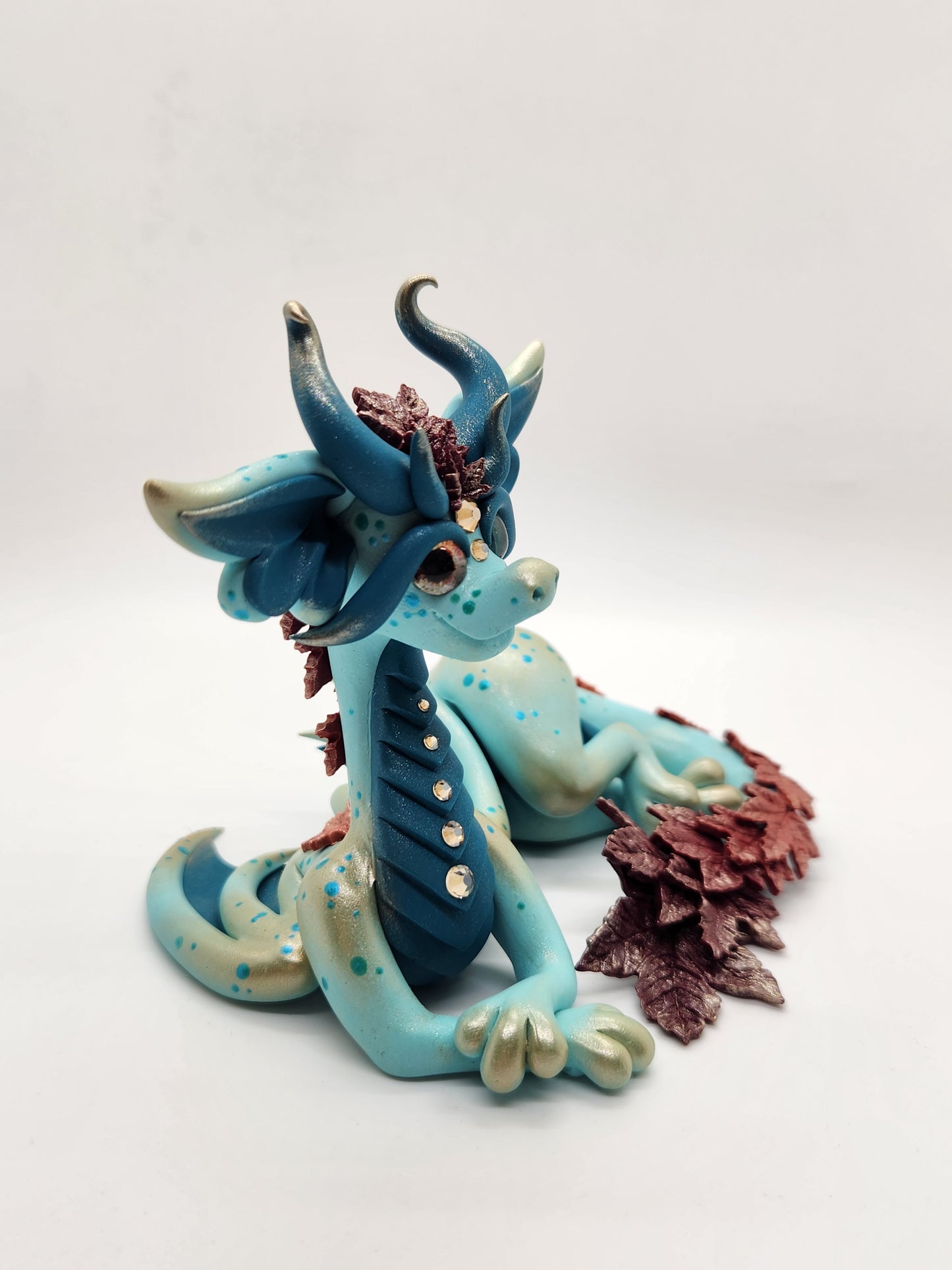 "Maple" blue and orange fall leaves dragon sculpture