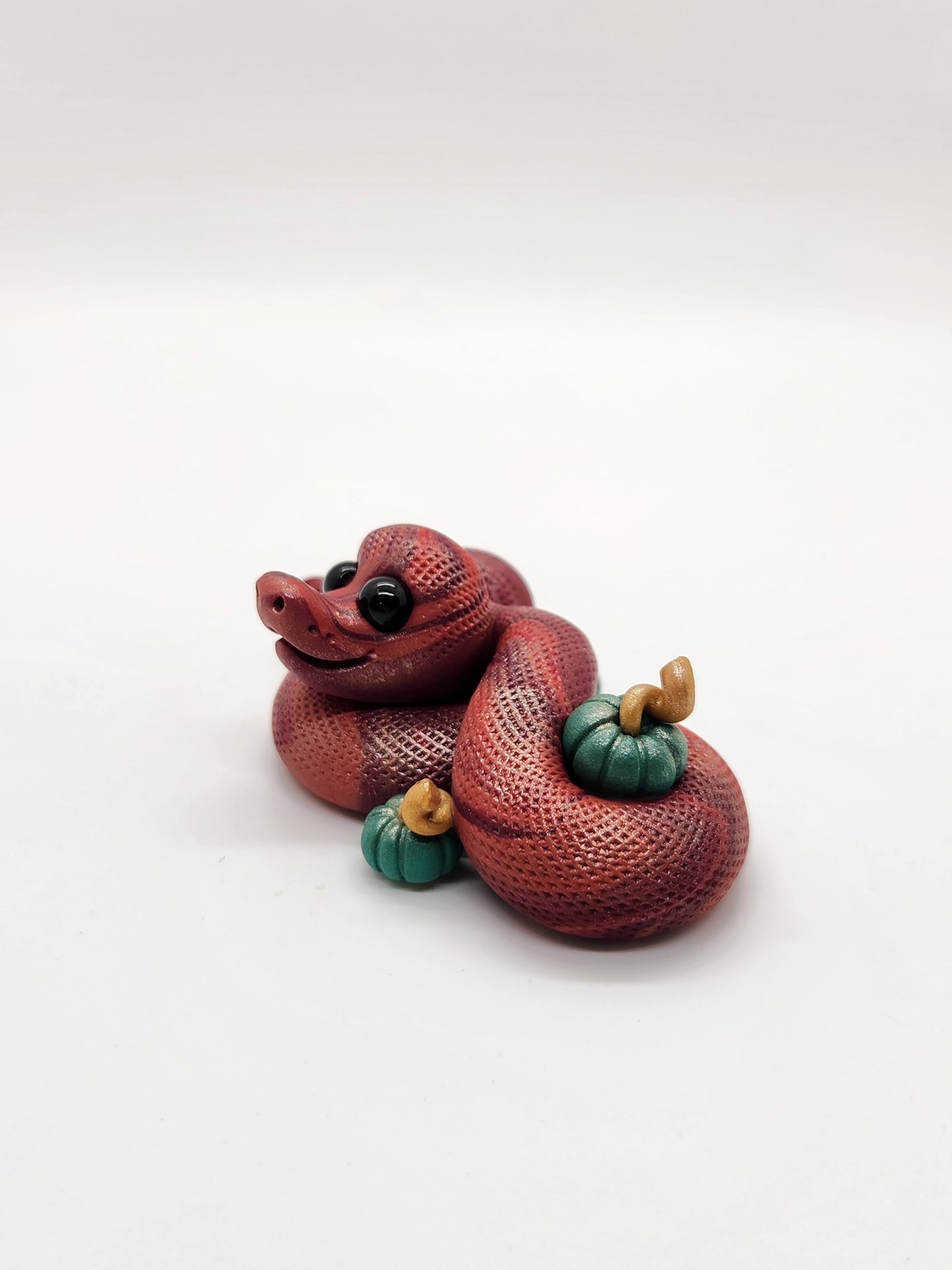 "Autumn" fall snake sculpture