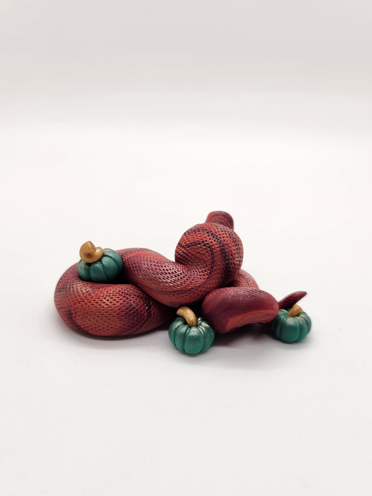 "Autumn" fall snake sculpture