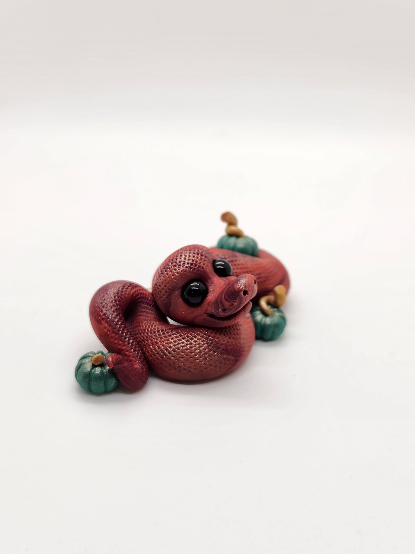 "Autumn" fall snake sculpture