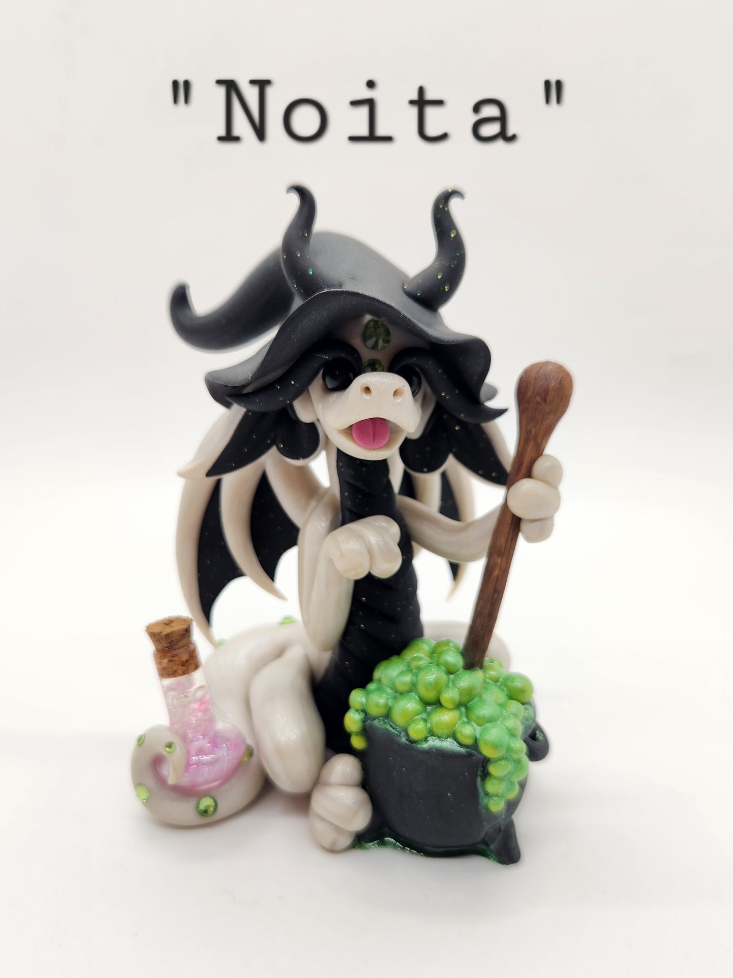 "Noita" white and black witch dragon sculpture