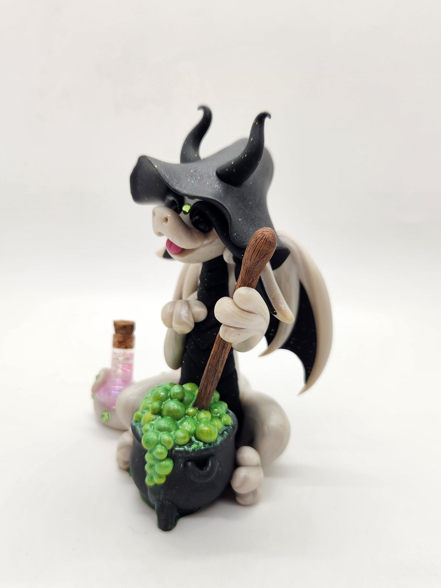 "Noita" white and black witch dragon sculpture