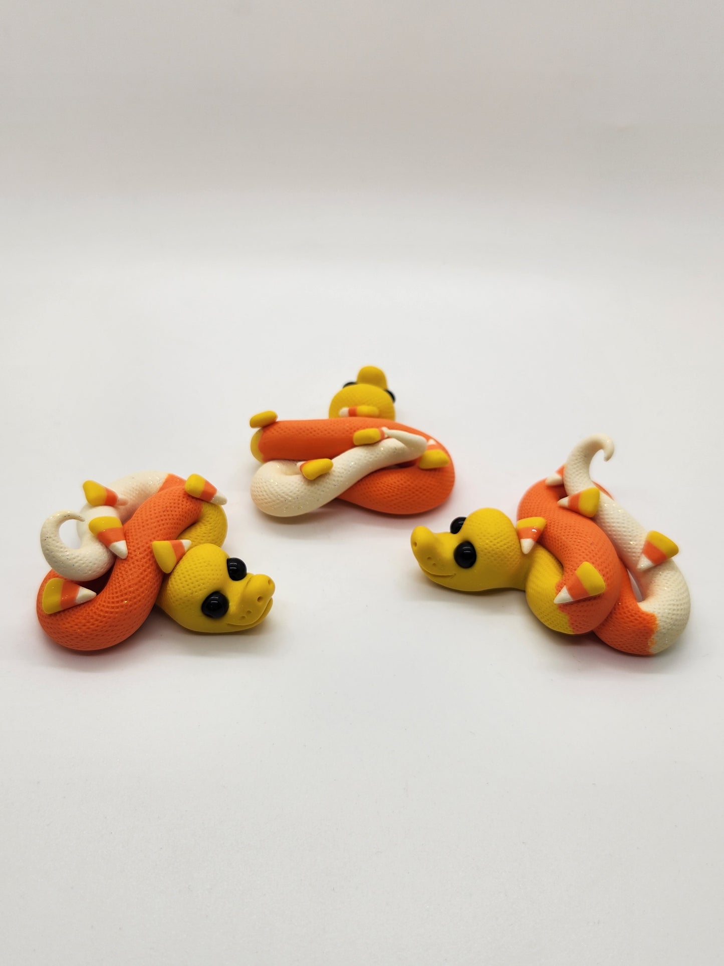 Candy corn snake sculpture