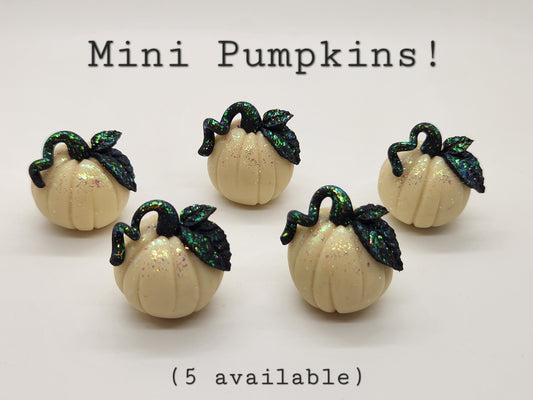 Mini glow in the dark pumpkin sculpture