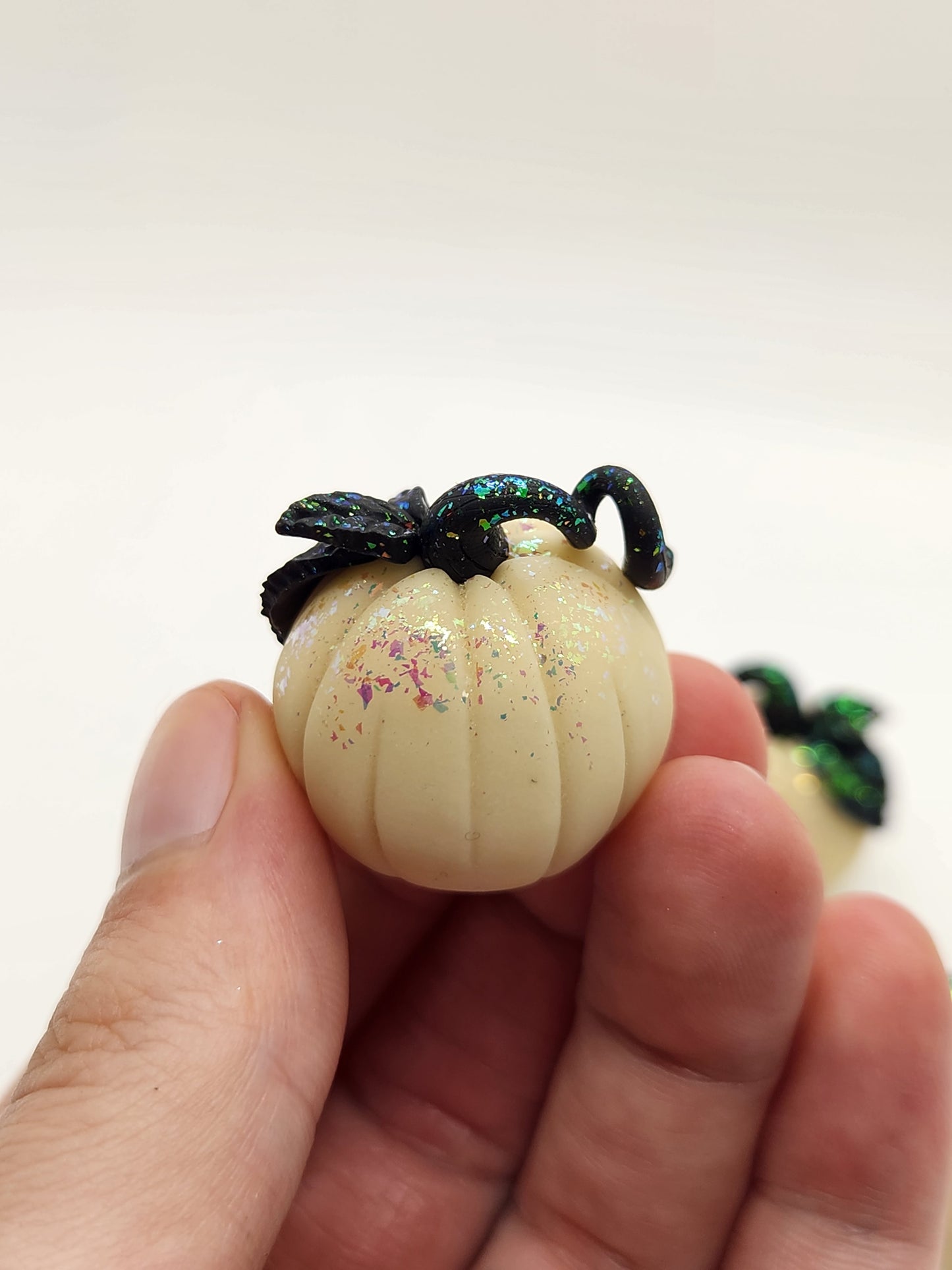 Mini glow in the dark pumpkin sculpture