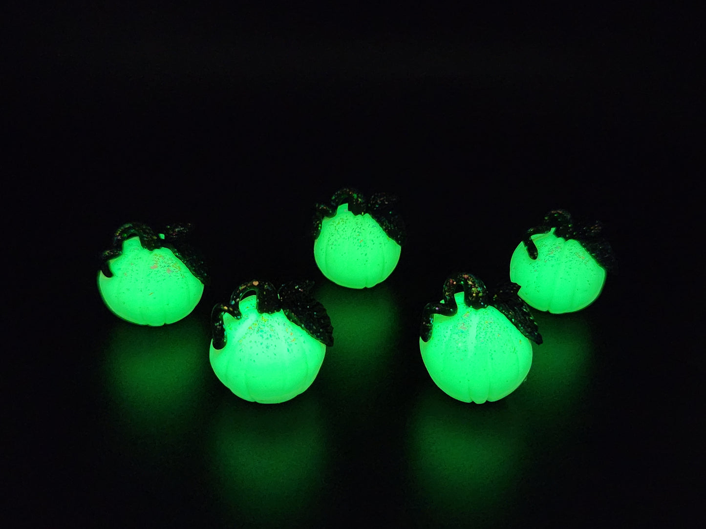 Mini glow in the dark pumpkin sculpture