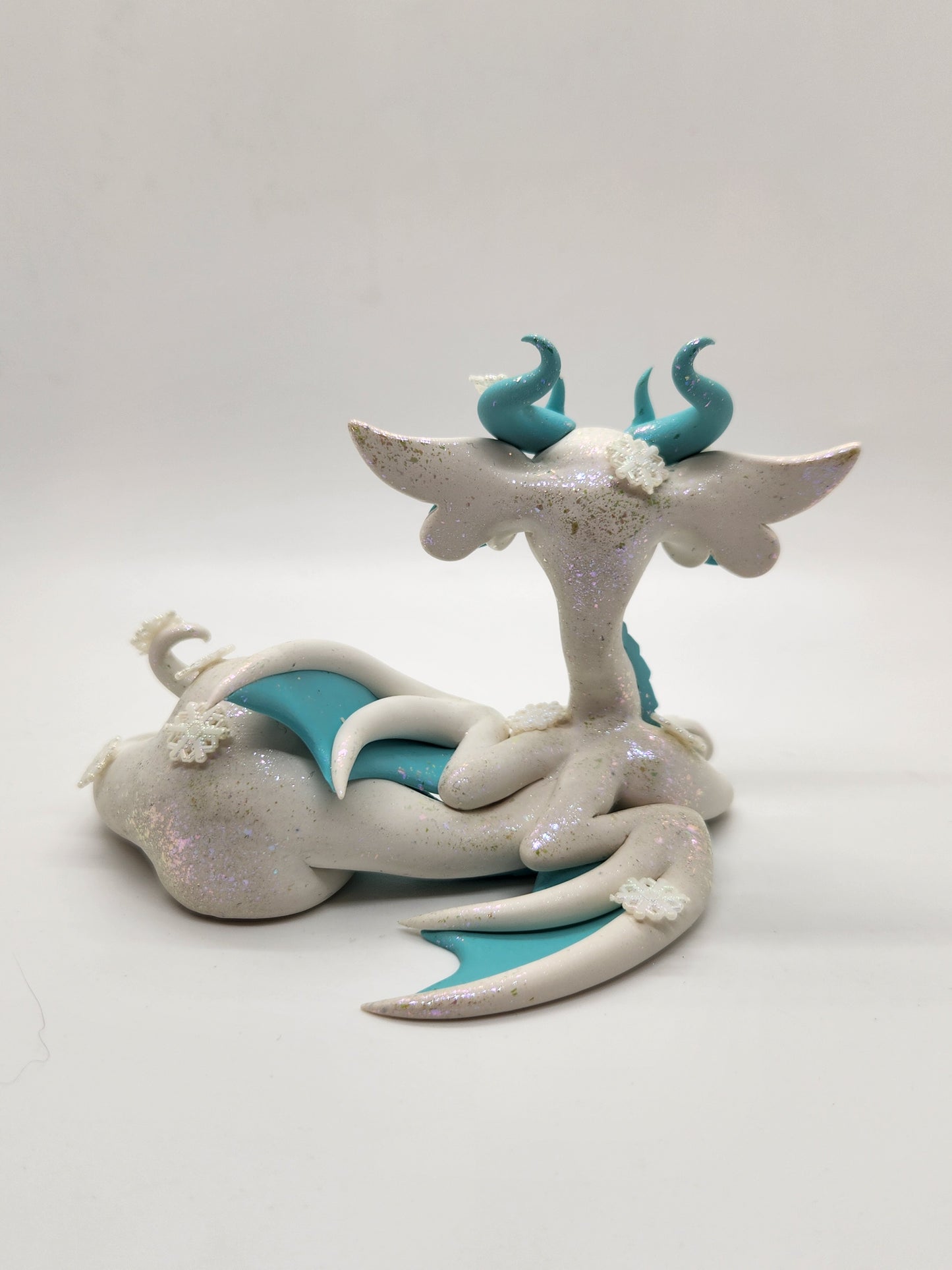 "Neve" White and blue snow dragon sculpture