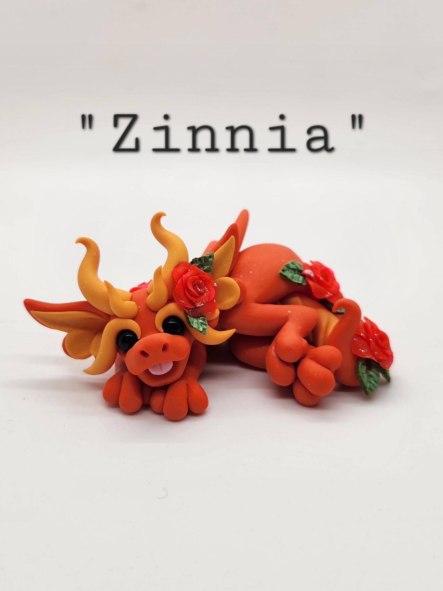 "Zinnia" orange flower dragon sculpture