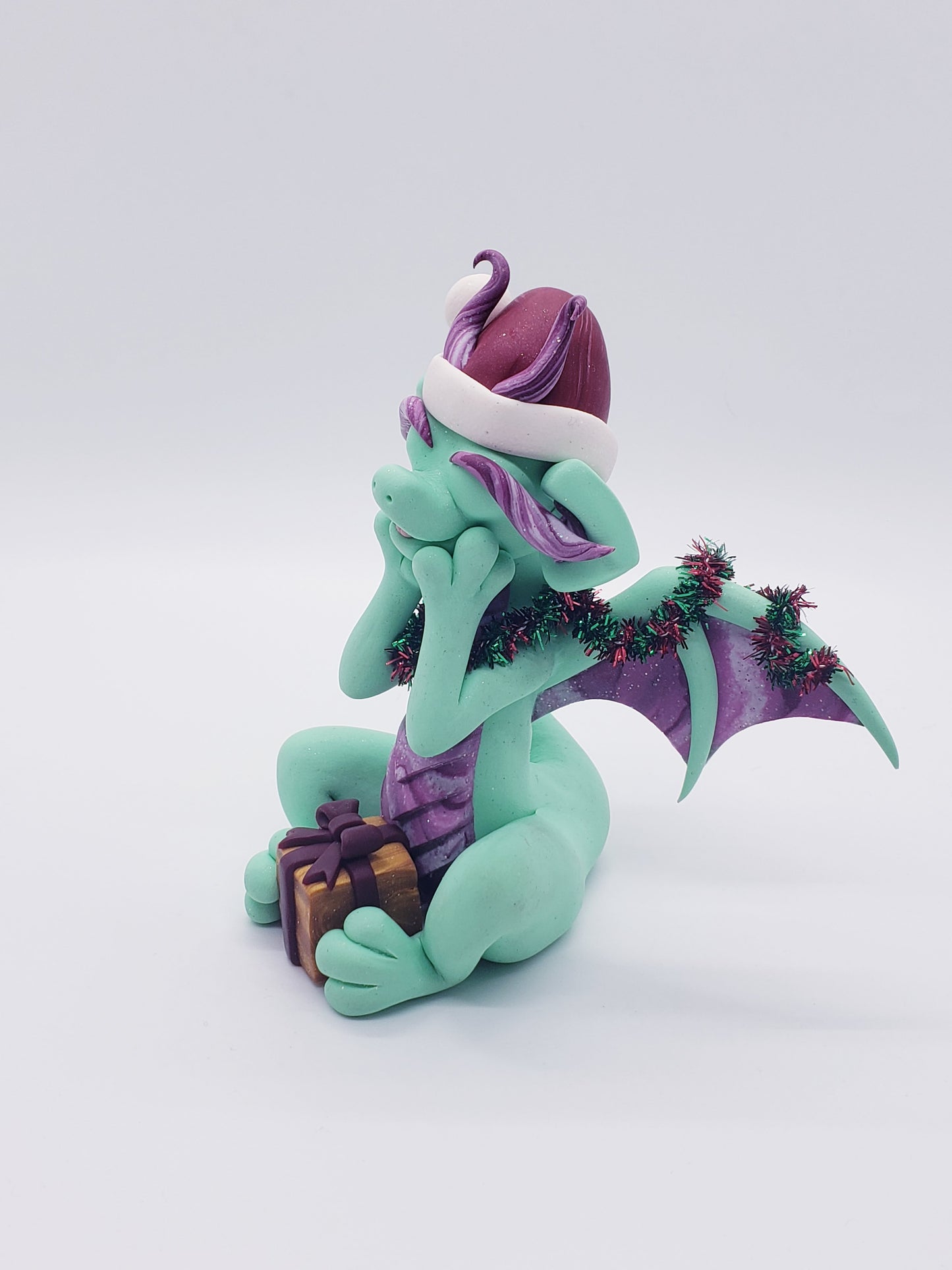 "Joy" christmas dragon sculpture