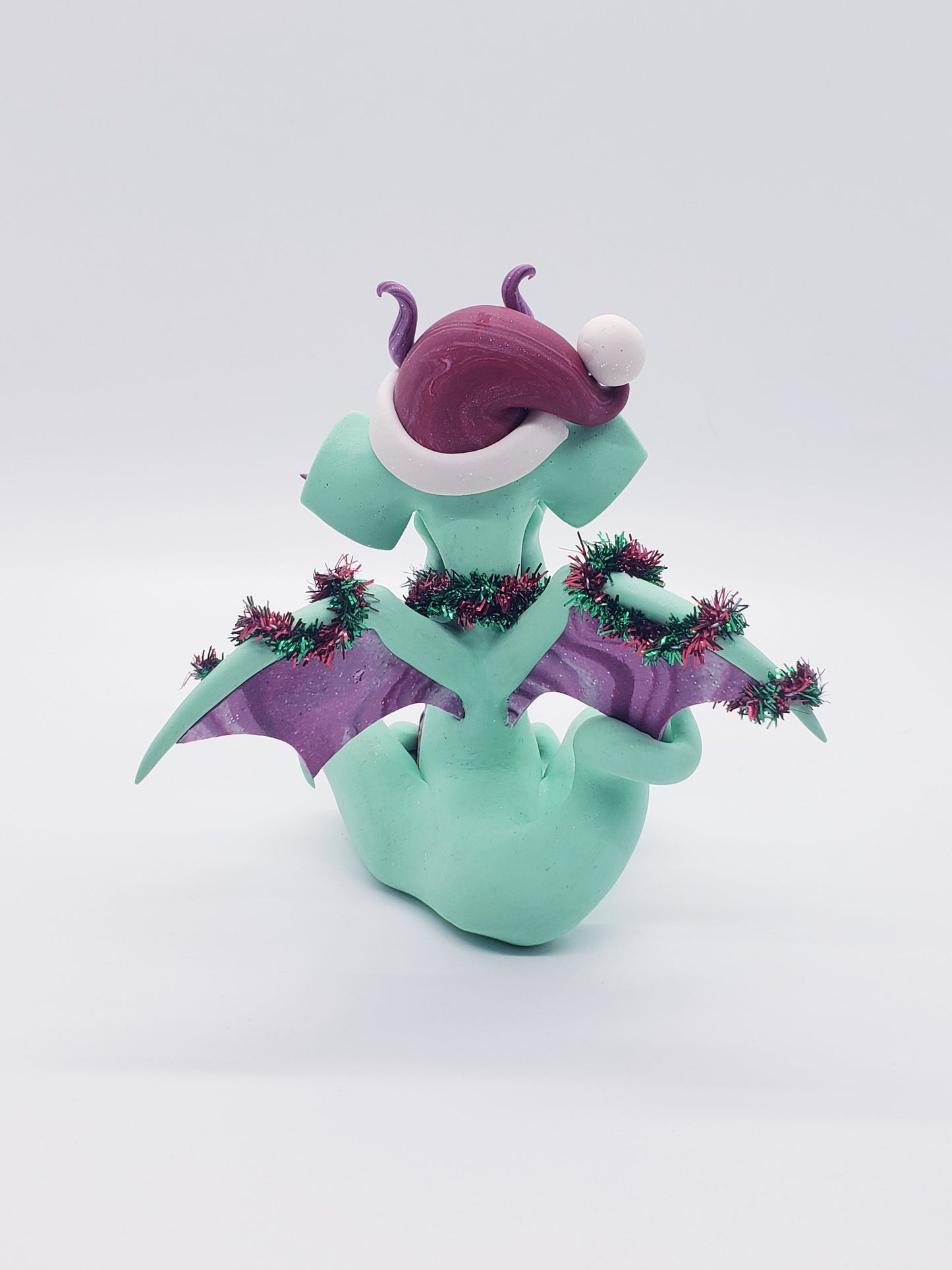 "Joy" christmas dragon sculpture