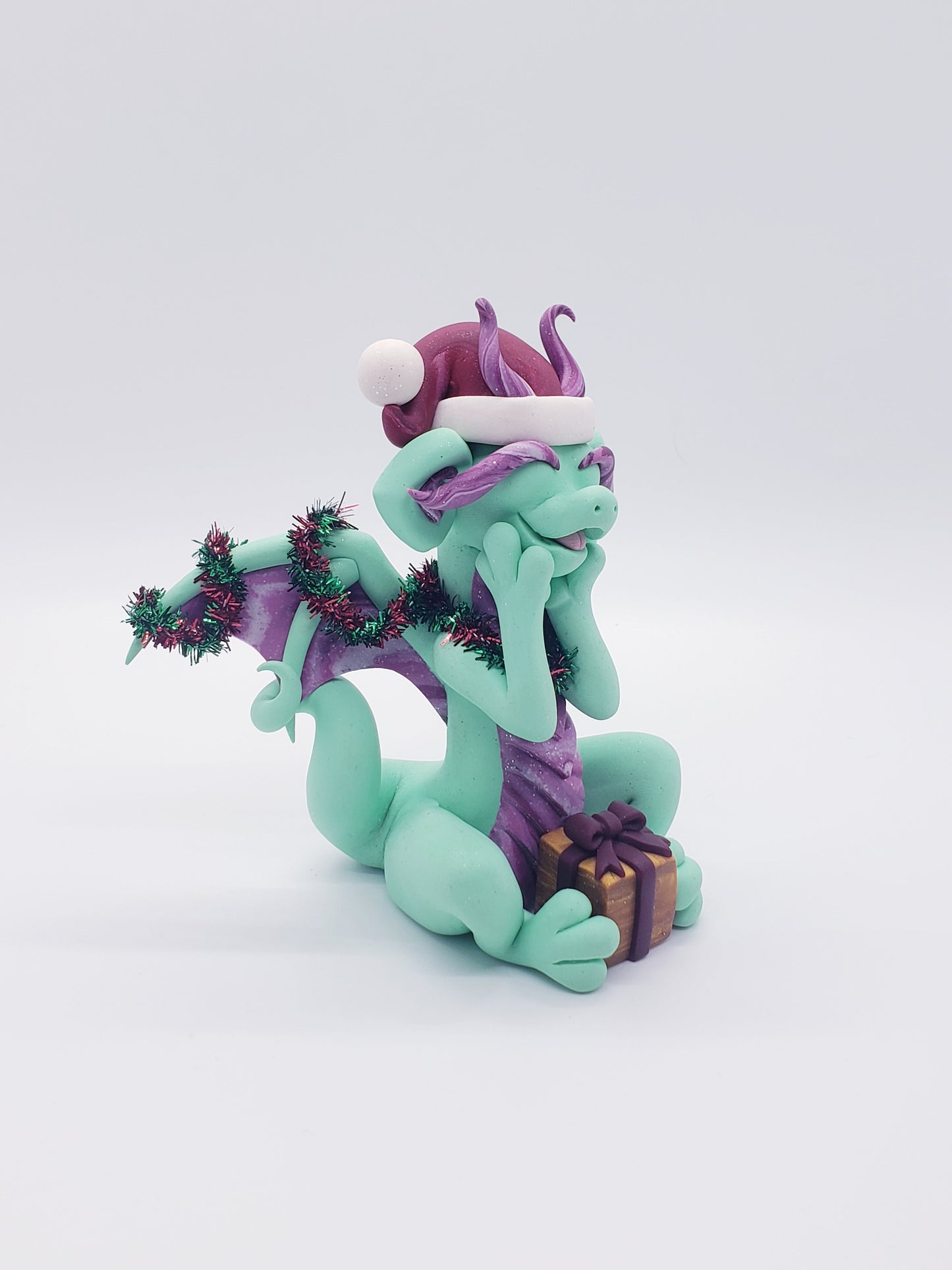 "Joy" christmas dragon sculpture