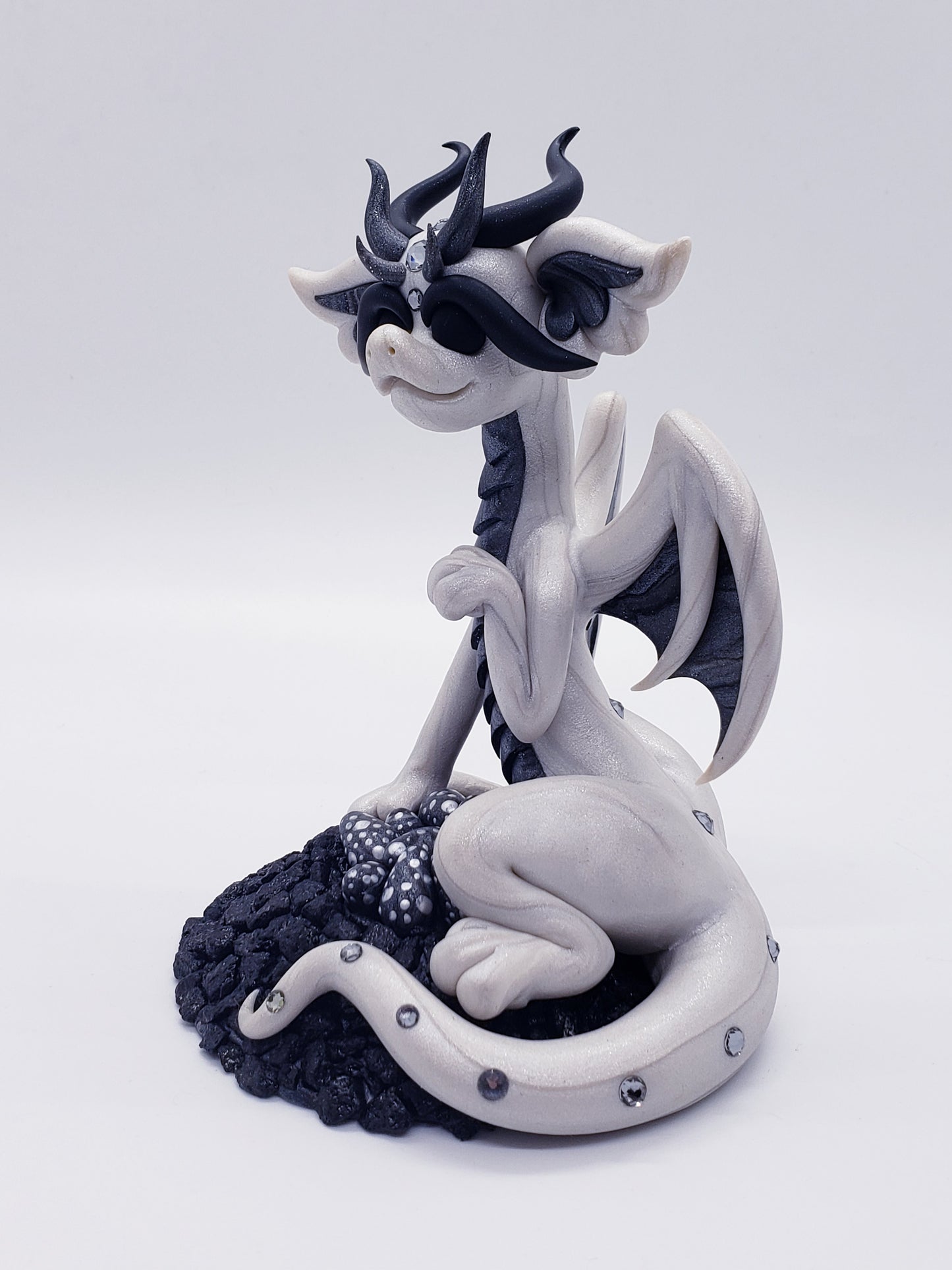 "Nënë" dragon scuplture with eggs