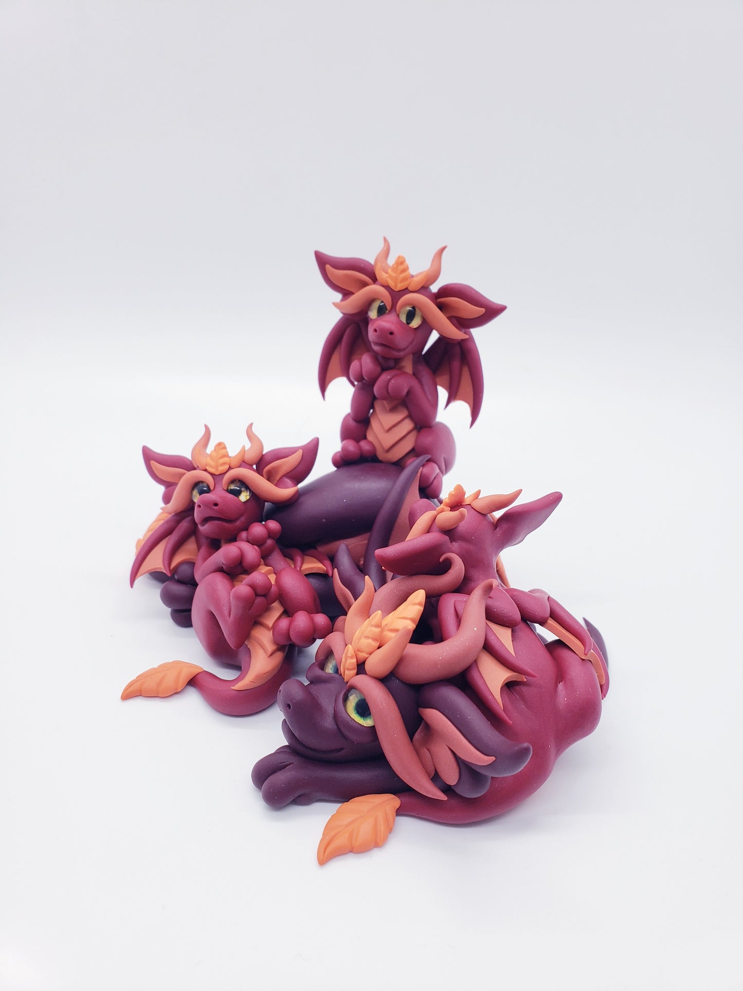 Red autumn dragon family sculpture