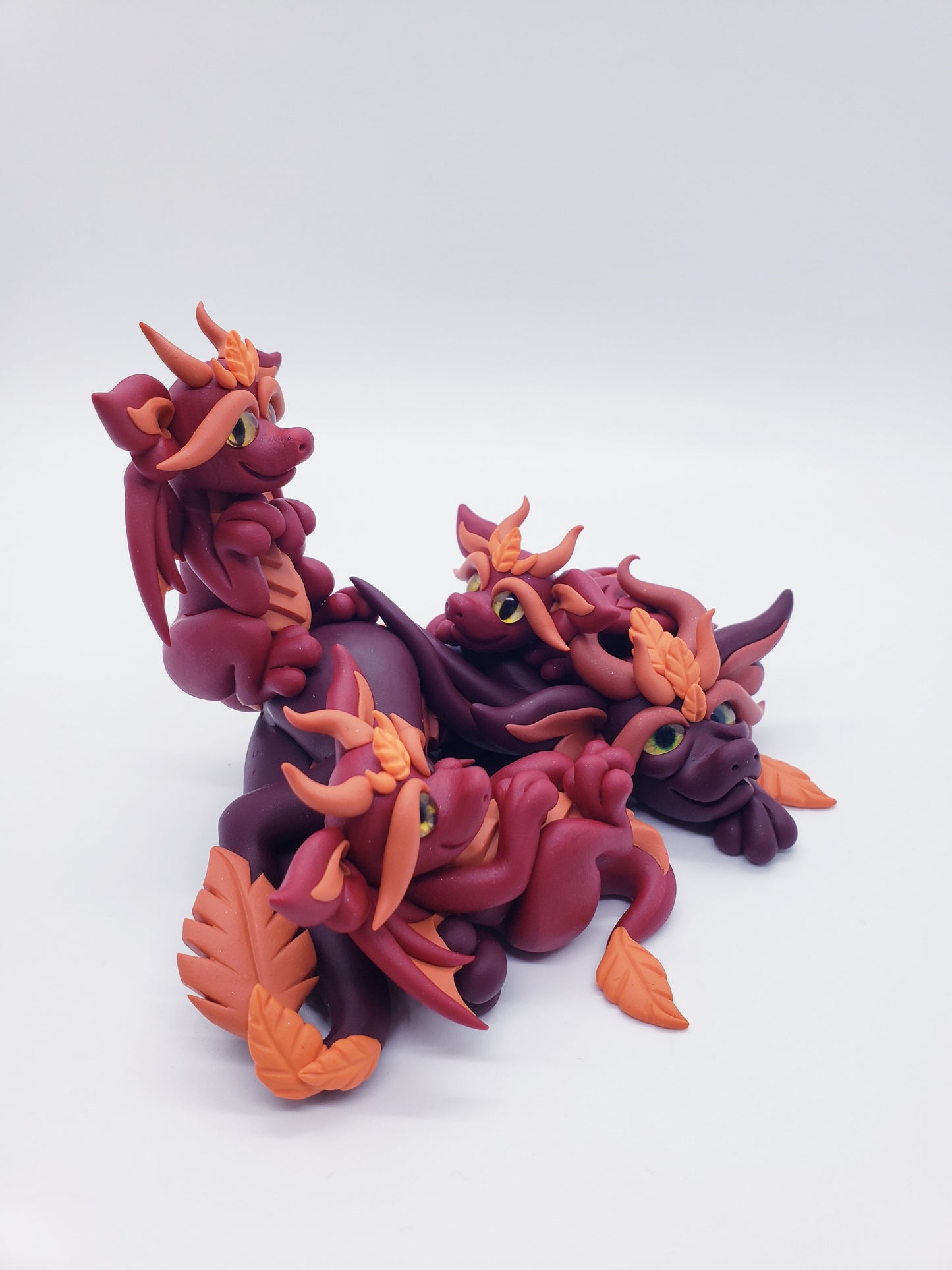 Red autumn dragon family sculpture