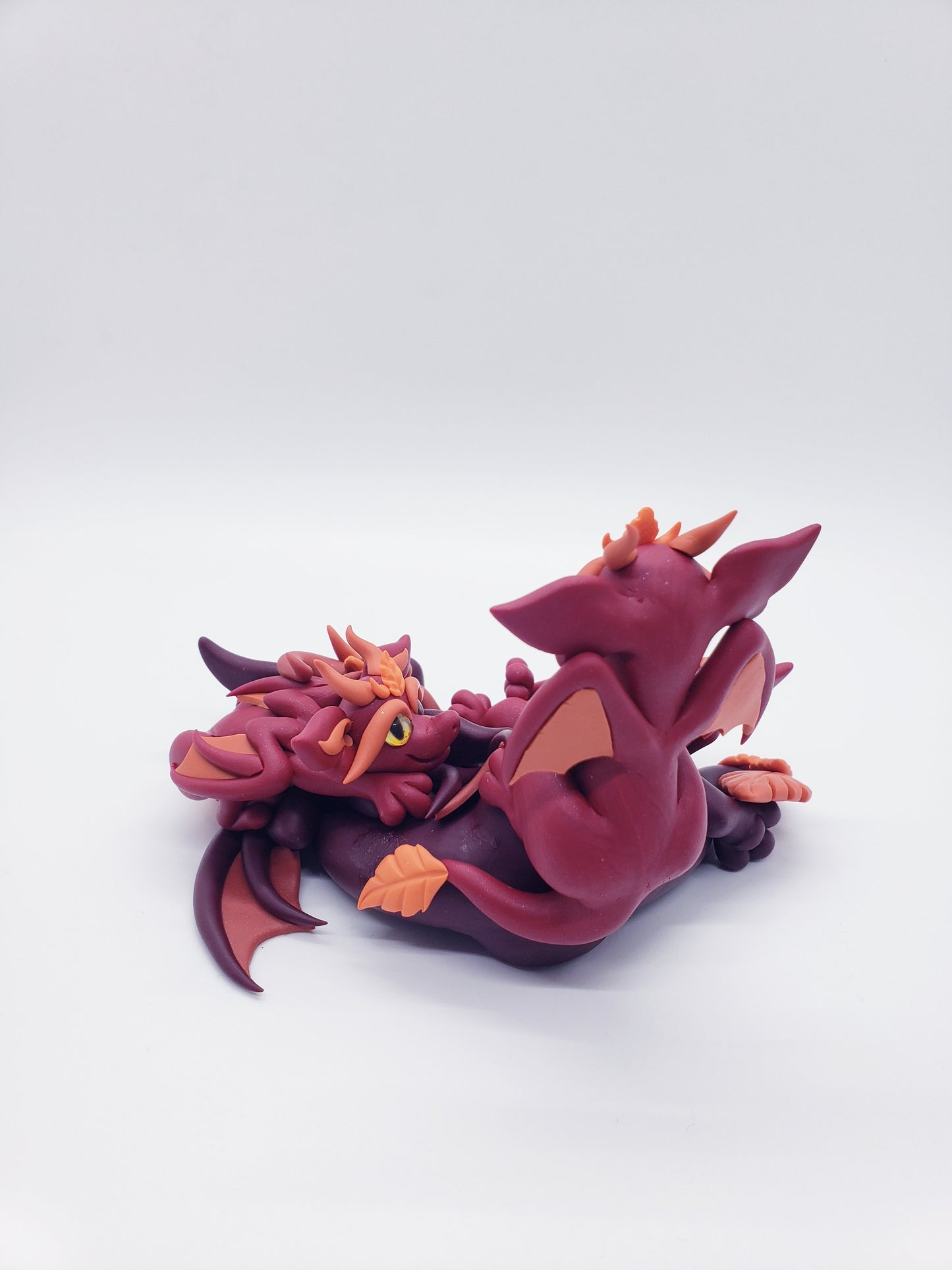 Red autumn dragon family sculpture