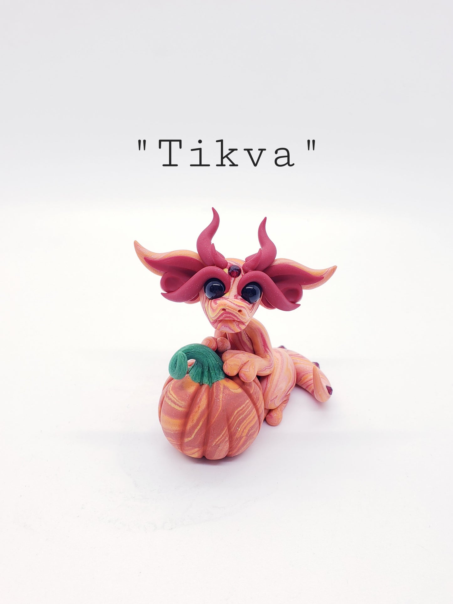 "Tikva" orang autumn pumpkin baby dragon sculpture