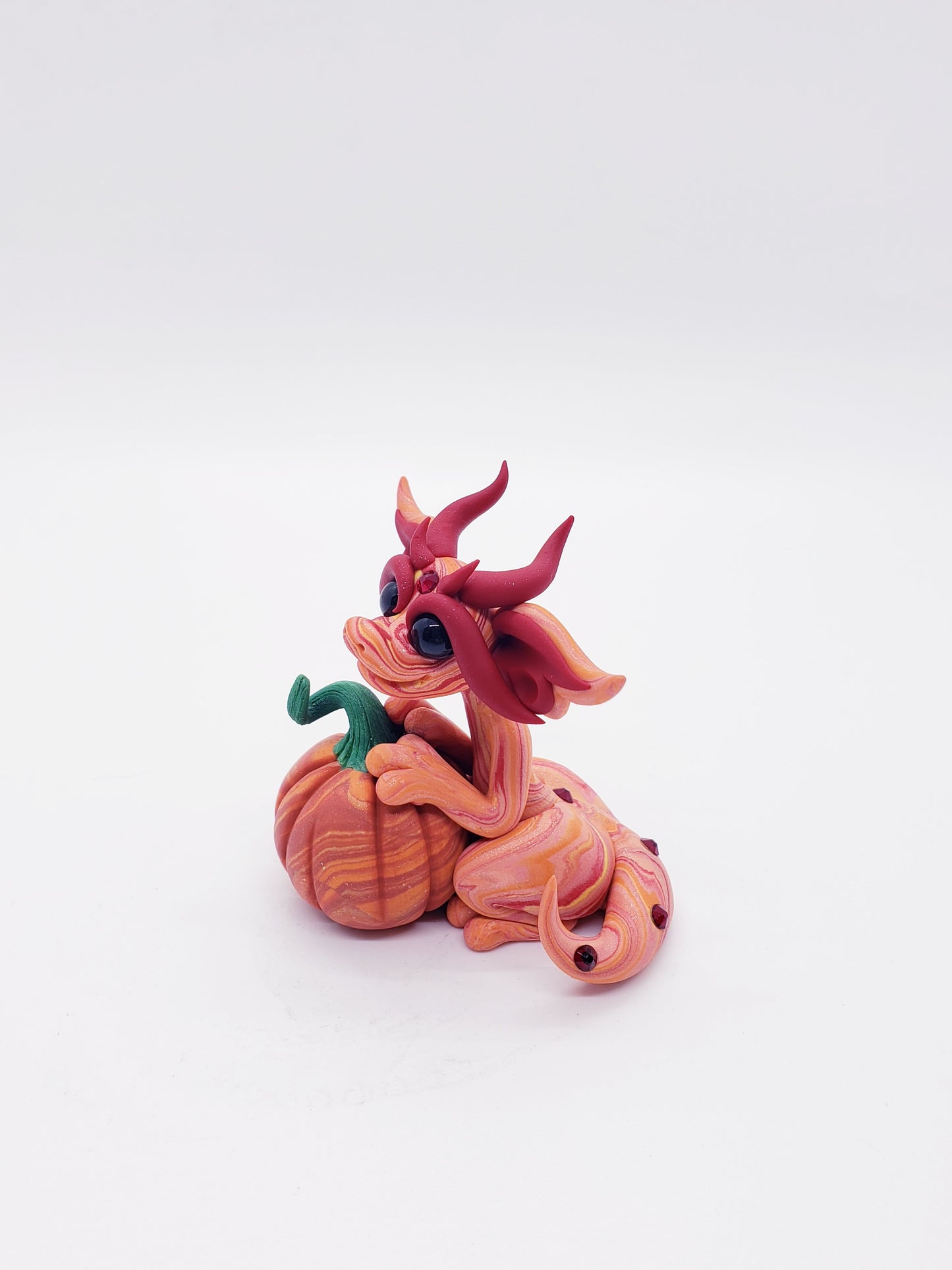 "Tikva" orang autumn pumpkin baby dragon sculpture