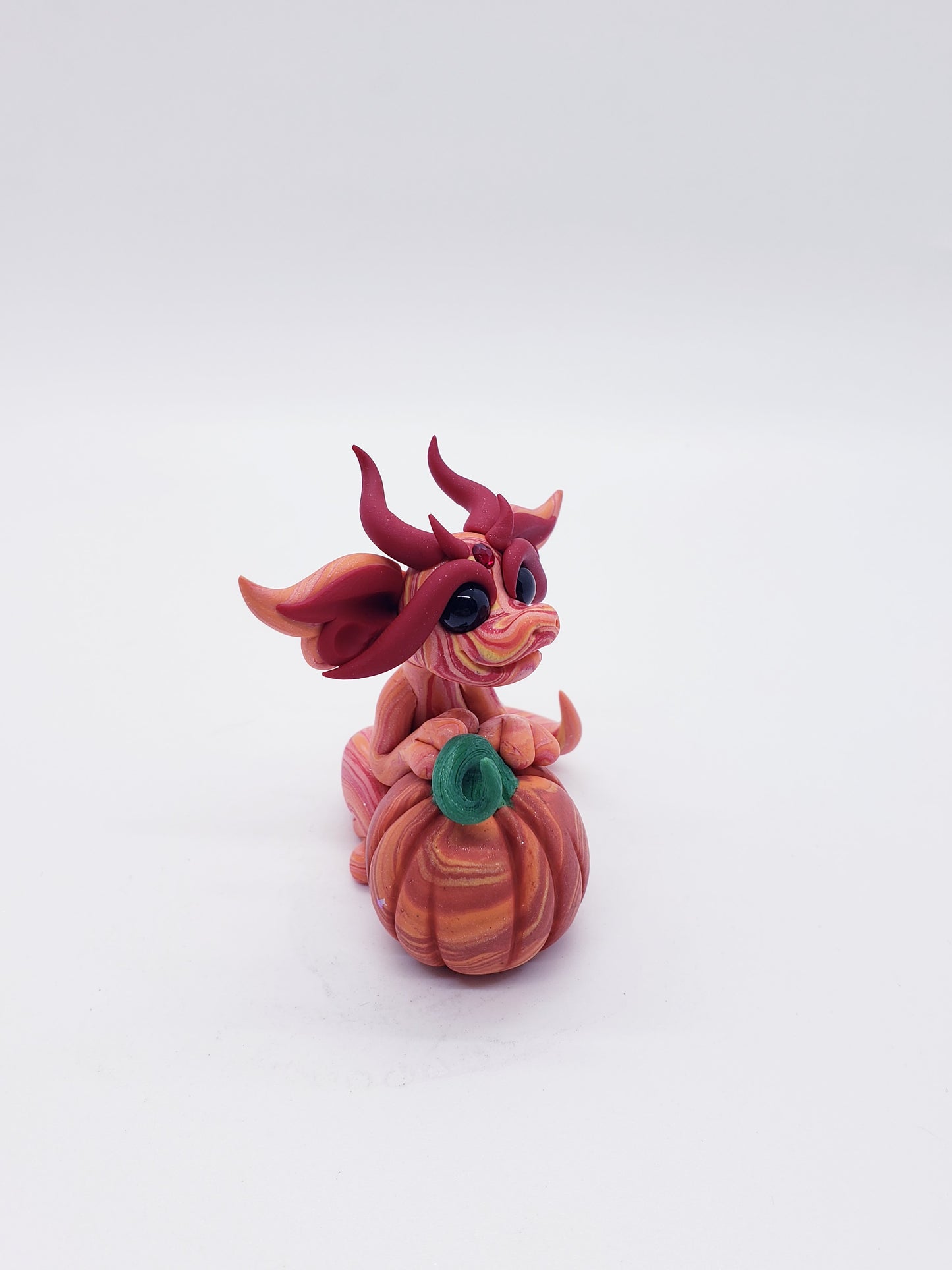 "Tikva" orang autumn pumpkin baby dragon sculpture