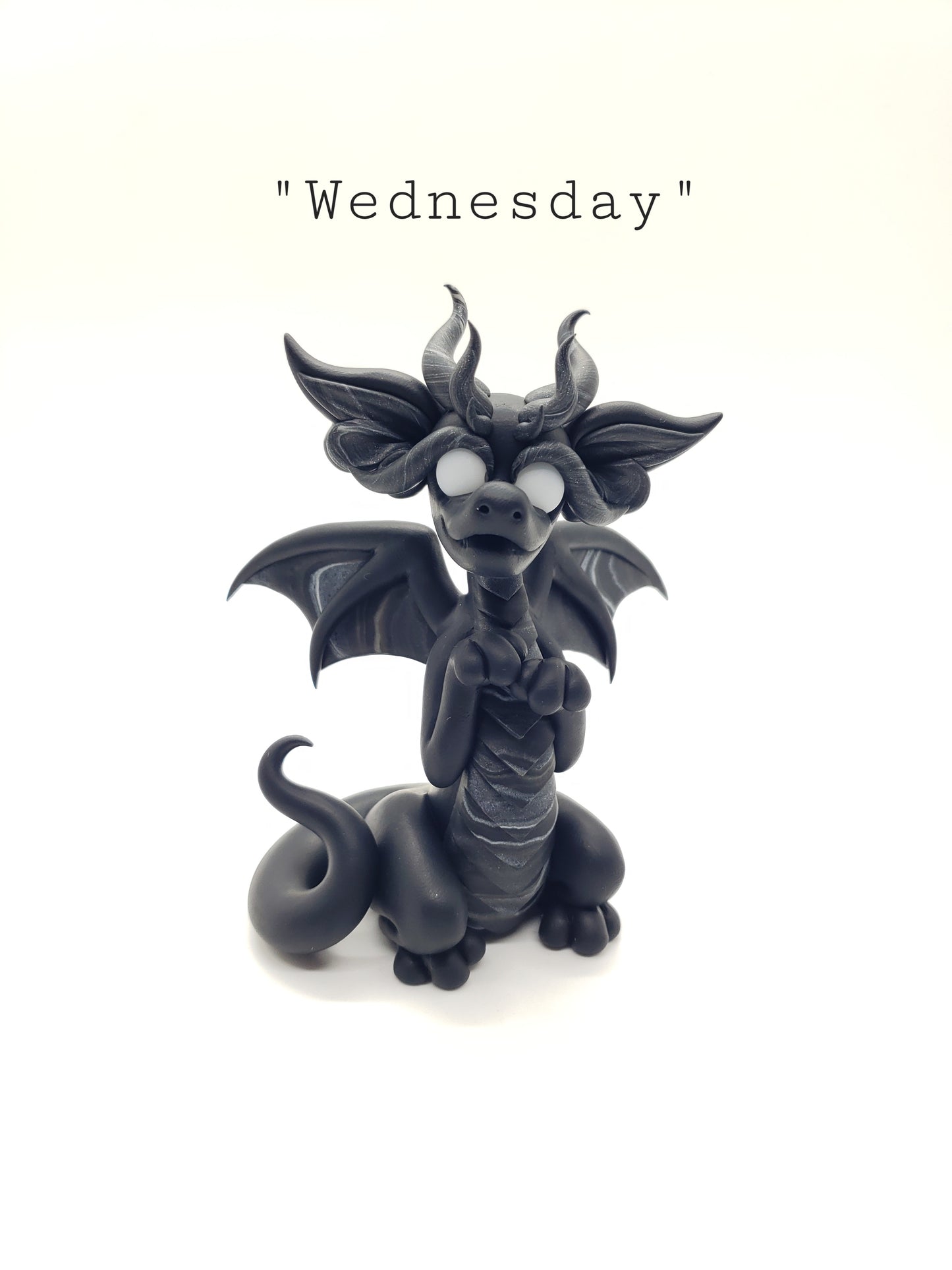 "Wednesday" black and white dragon sculpture