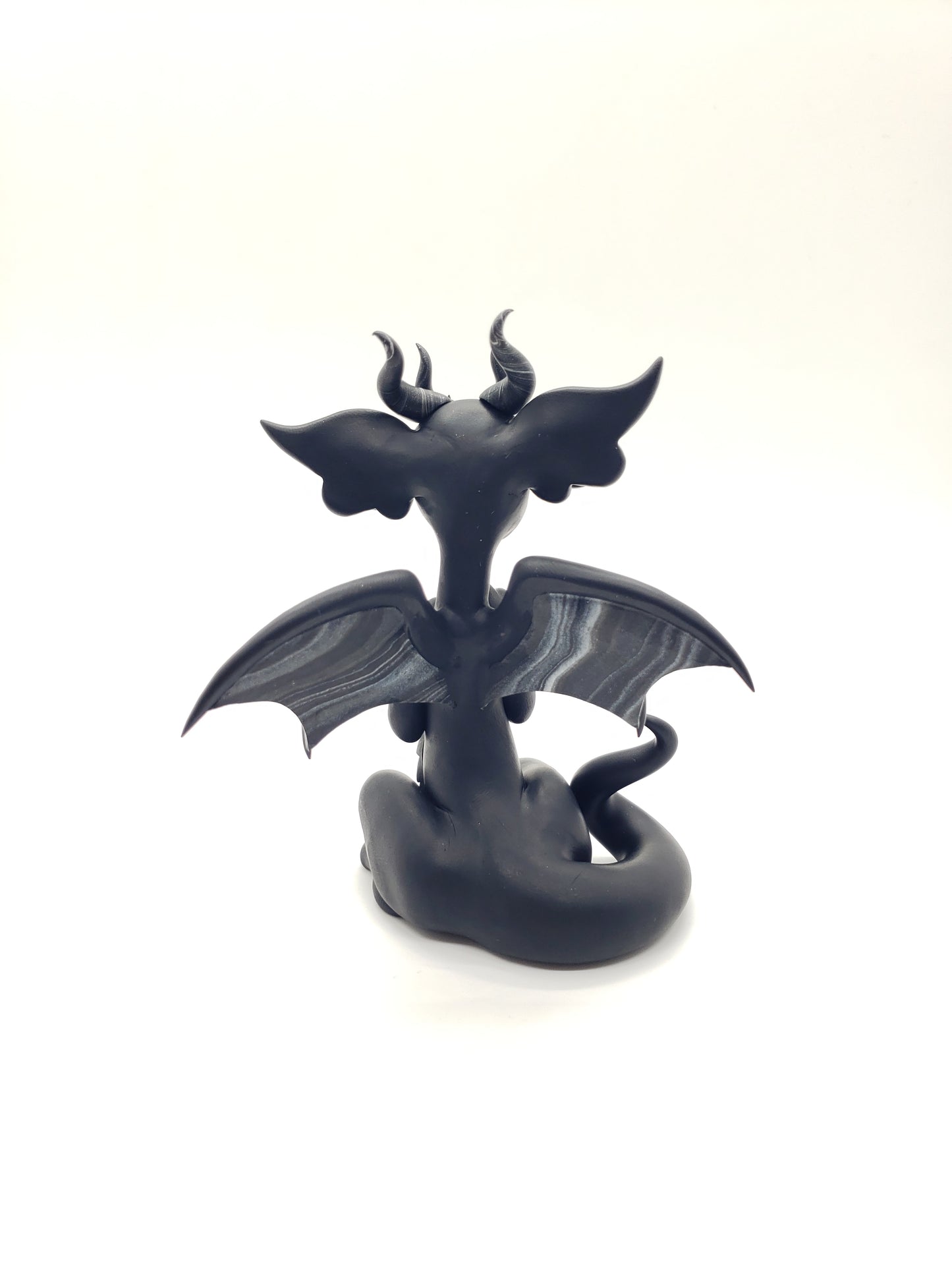 "Wednesday" black and white dragon sculpture