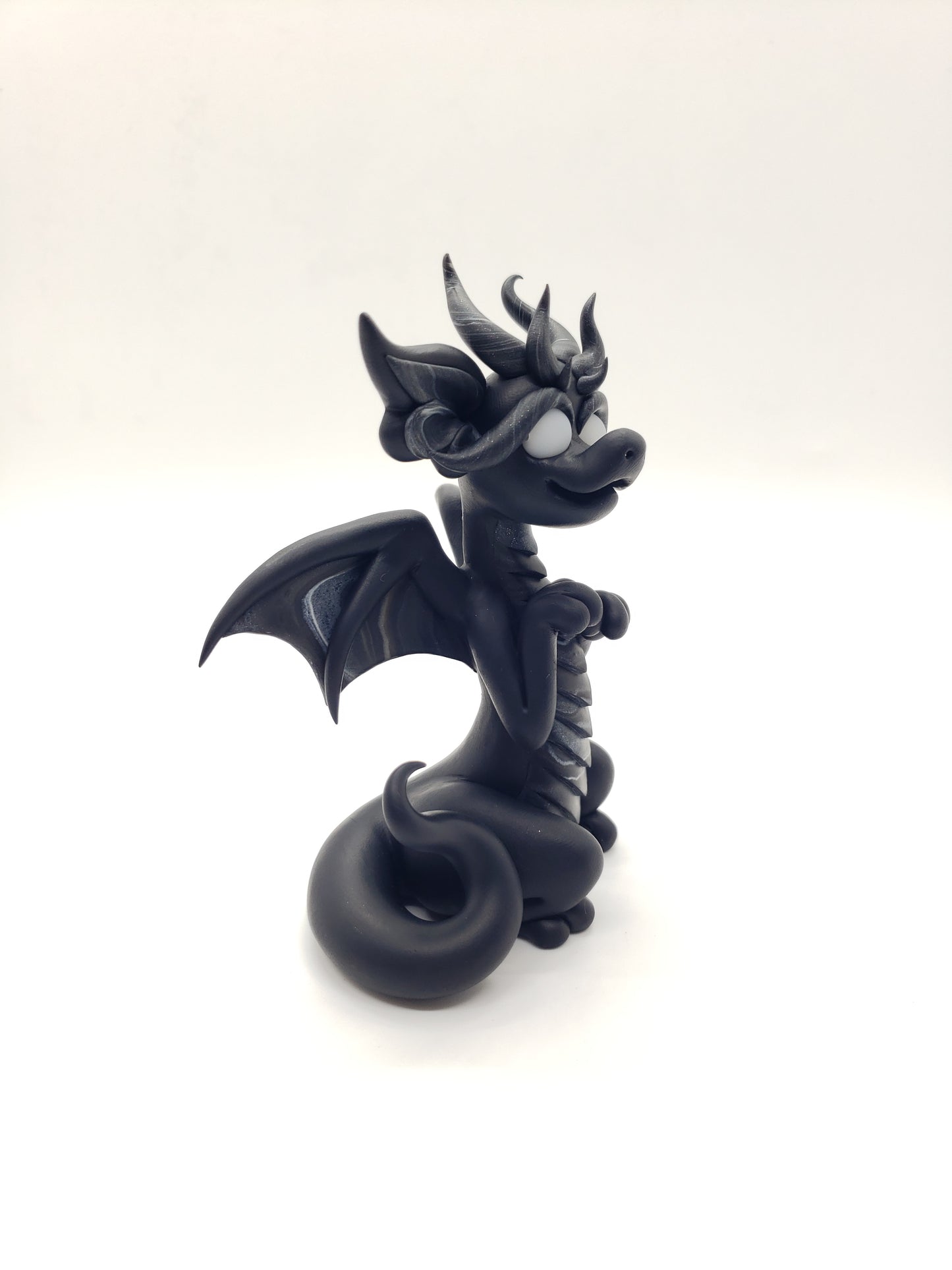 "Wednesday" black and white dragon sculpture